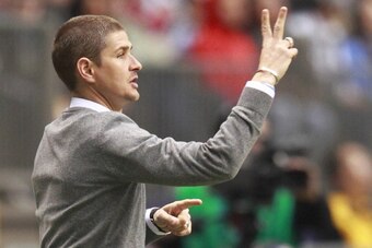 VANCOUVER, BC - APRIL 5:  Head coach Carl Robinson of the Vancouver Whitecaps FC during their MLS game against the Colorado Rapids April 5, 2014 in Vancouver, British Columbia, Canada. Colorado won 2-1. (Photo by Jeff Vinnick/Getty Images)