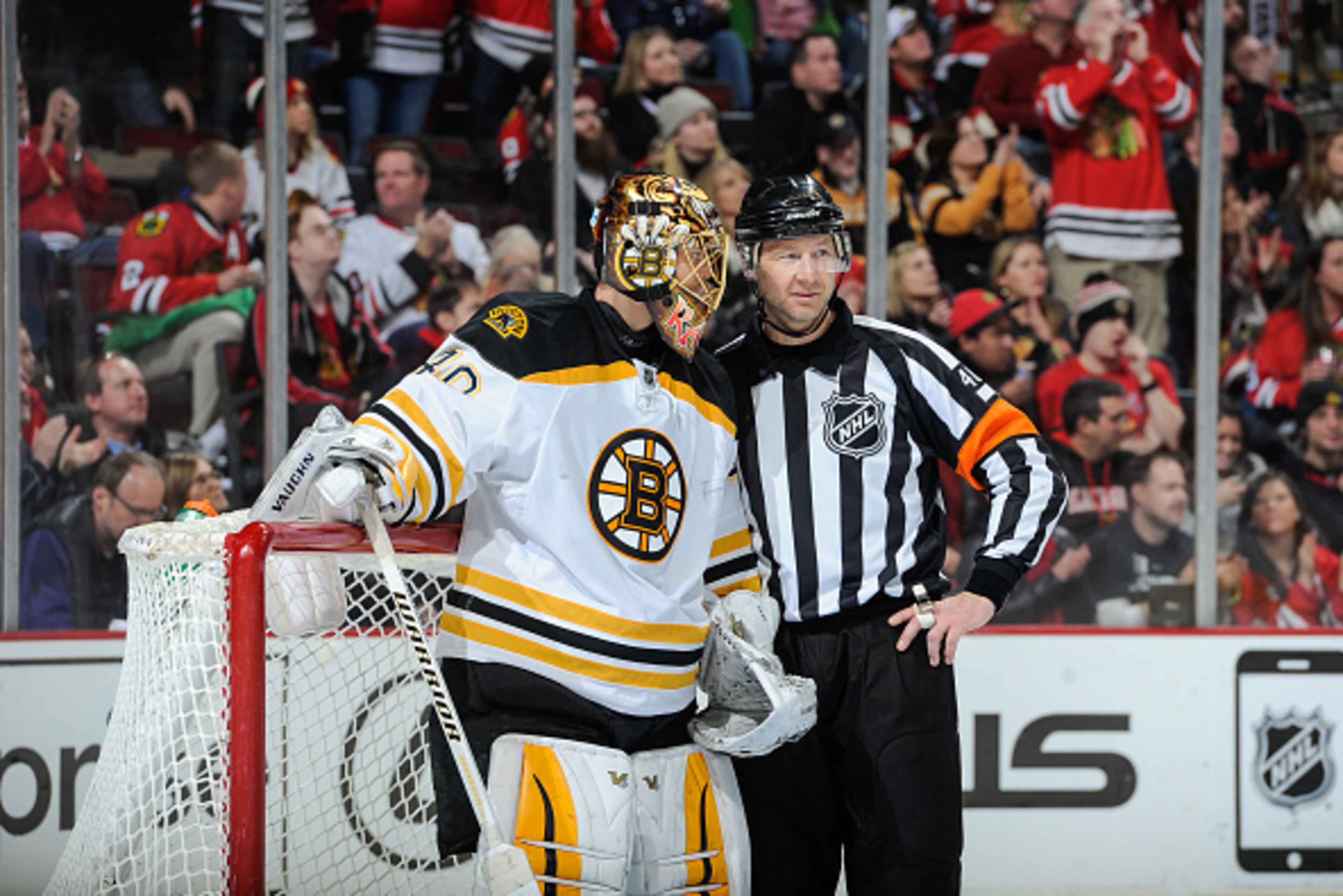 CHICAGO, IL - FEBRUARY 22:  Goalie Tuukka Rask #40 of the Boston Bruins talks with referee Steve Kozari #40 during the NHL game at the United Center on February 22, 2015 in Chicago, Illinois.  (Photo by Bill Smith/NHLI via Getty Images)