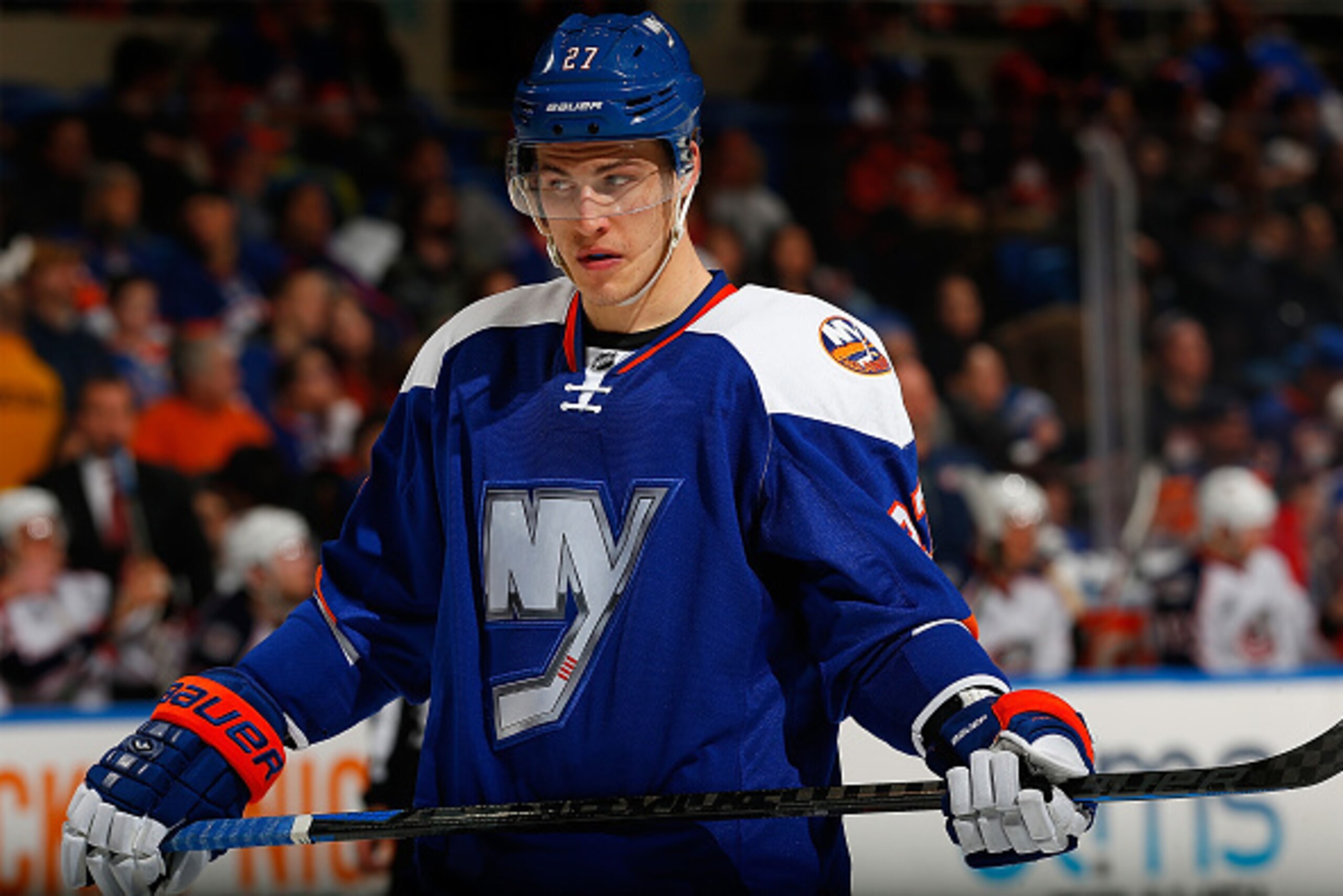 UNIONDALE, NY - FEBRUARY 14:  Anders Lee #27 of the New York Islanders skates against the Columbus Blue Jackets at Nassau Veterans Memorial Coliseum on February 14, 2015 in Uniondale, New York. The New York Islanders defeated the Columbus Blue Jackets 6-3
