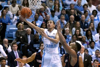 CHAPEL HILL, NC - FEBRUARY 02:  Marcus Paige #5 of the North Carolina Tar Heels drives to the basket against the Virginia Cavaliers during a game at the Dean Smith Center on February 2, 2015 in Chapel Hill, North Carolina. Virginia won 75-64.  (Photo by G