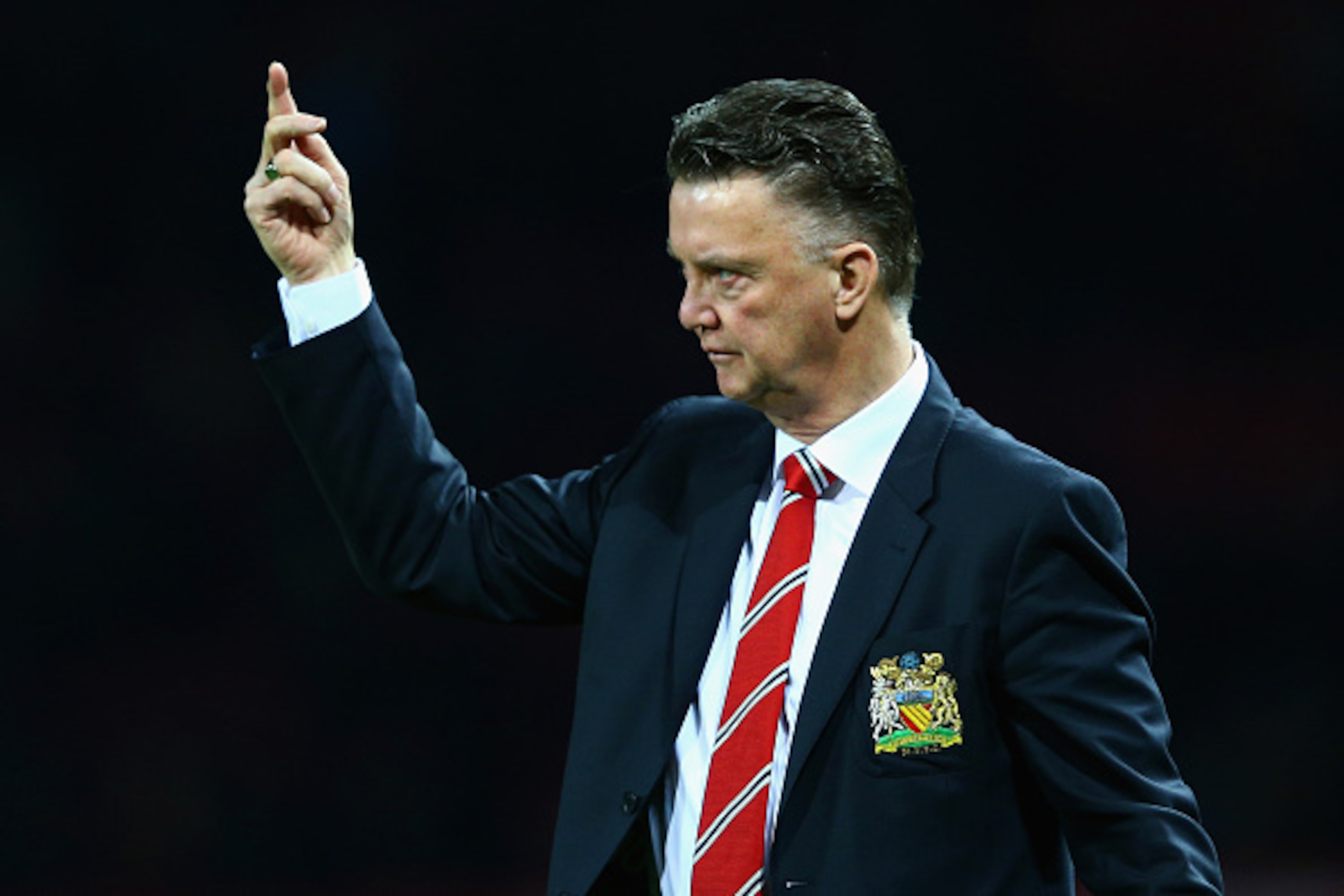 MANCHESTER, ENGLAND - FEBRUARY 03:  Manager Louis van Gaal of Manchester United gestures during the FA Cup Fourth round replay match between Manchester United and Cambridge United at Old Trafford on February 3, 2015 in Manchester, England.  (Photo by Cliv