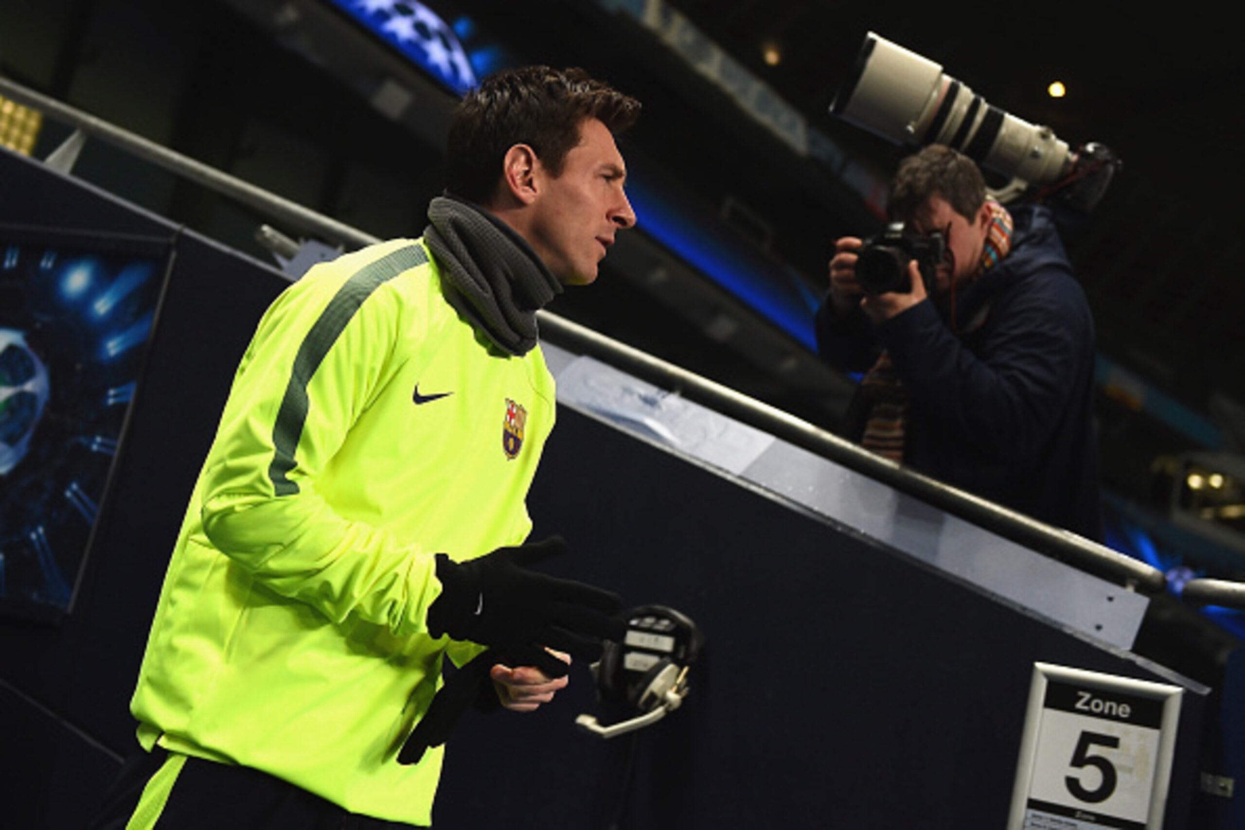 MANCHESTER, ENGLAND - FEBRUARY 23:  Lionel Messi of Barcelona makes his way onto the pitch during a Barcelona training session ahead of the UEFA Champions League round of 16 first leg match against Manchester City at Etihad Stadium on February 23, 2015 in
