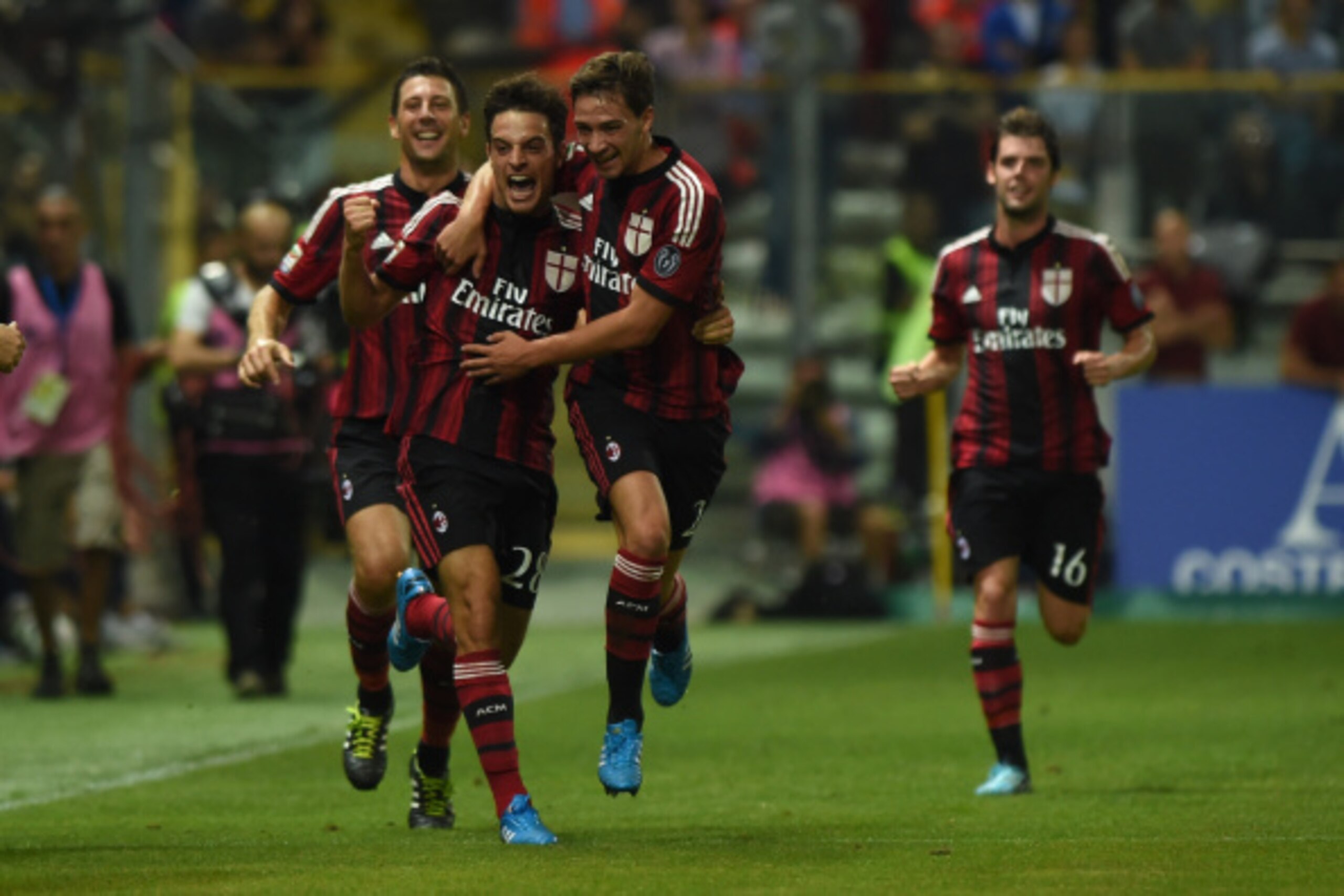 PARMA, ITALY - SEPTEMBER 14: Giacomo Bonaventura (L) of AC Milan celebrate the opening goal with team-mate Mattia De Sciglio during the Serie A match between Parma FC and AC Milan at Stadio Ennio Tardini on September 14, 2014 in Parma, Italy. (Photo by PARMA, ITALY - SEPTEMBER 14: Giacomo Bonaventura (L) of AC Milan celebrate the opening goal with team-mate Mattia De Sciglio during the Serie A match between Parma FC and AC Milan at Stadio Ennio Tardini on September 14, 2014 in Parma, Italy. (Photo by