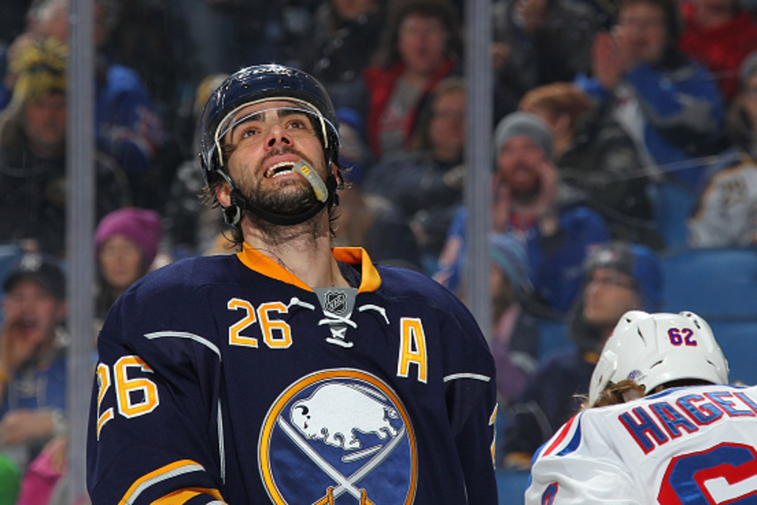 BUFFALO, NY - FEBRUARY 20: Matt Moulson #26 of the Buffalo Sabres reacts after missing a scoring chance against the New York Rangers on February 20, 2015 at the First Niagara Center in Buffalo, New York. New York won, 3-1.  (Photo by Bill Wippert/NHLI via