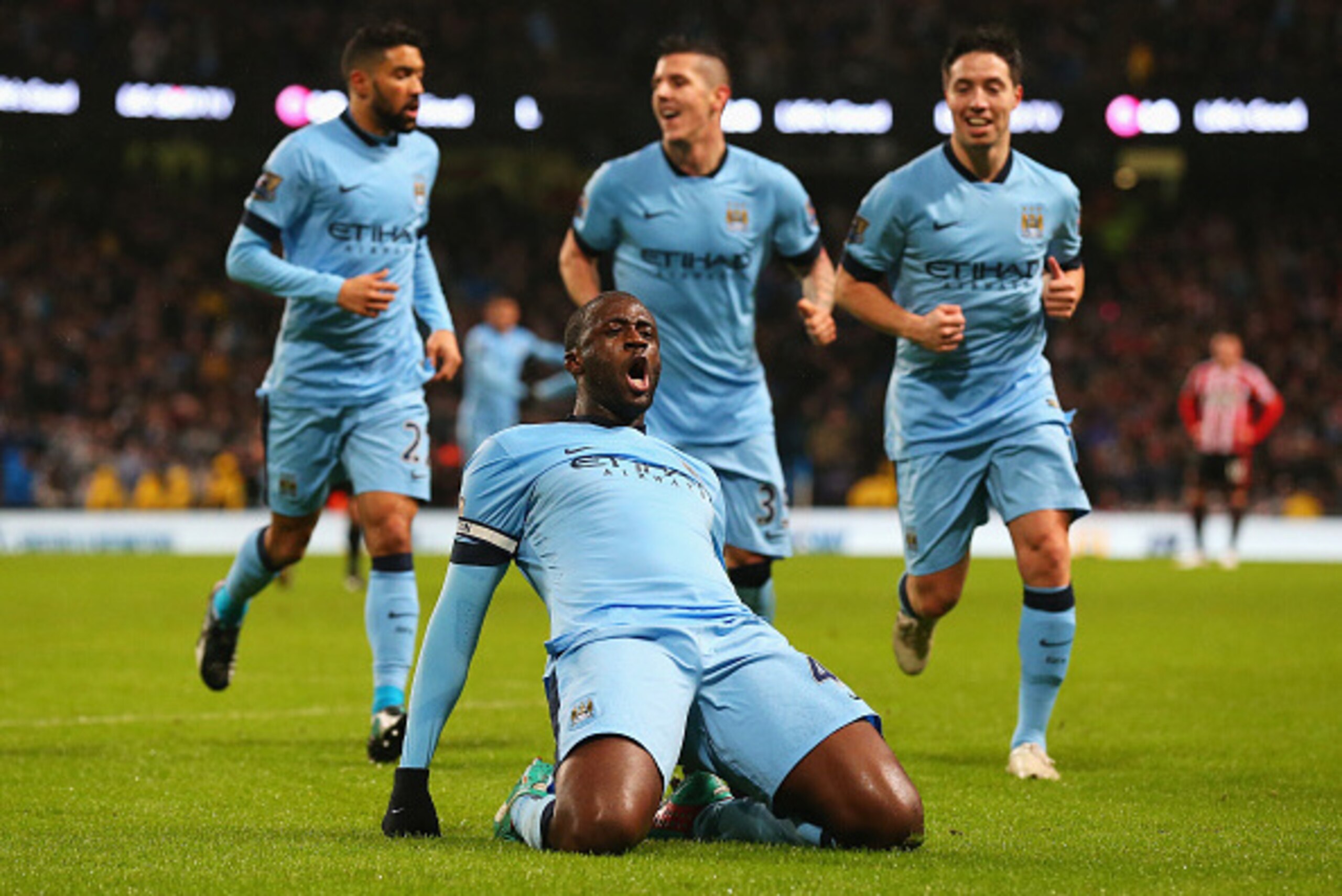 MANCHESTER, ENGLAND - JANUARY 01:  Yaya Toure of Manchester City celebrates the opening goal during the Barclays Premier League match between Manchester City and Sunderland at Etihad Stadium on January 1, 2015 in Manchester, England.  (Photo by Alex Lives