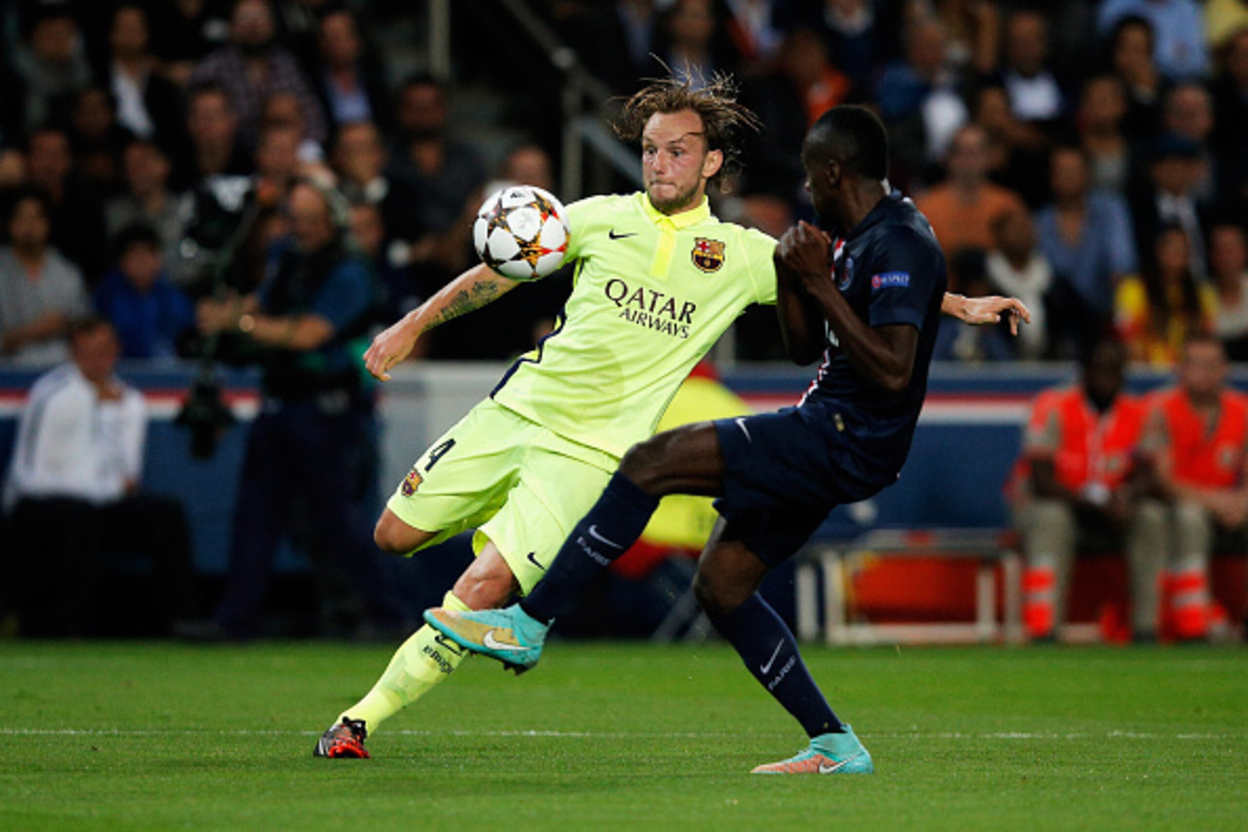 PARIS, FRANCE - SEPTEMBER 30:  Blaise Matuidi of PSG attempts to stop the shot on goal from Ivan Rakitic of Barcelona during the Group F UEFA Champions League match between Paris Saint-Germain v FC Barcelona held at Parc des Princes on September 30, 2014 