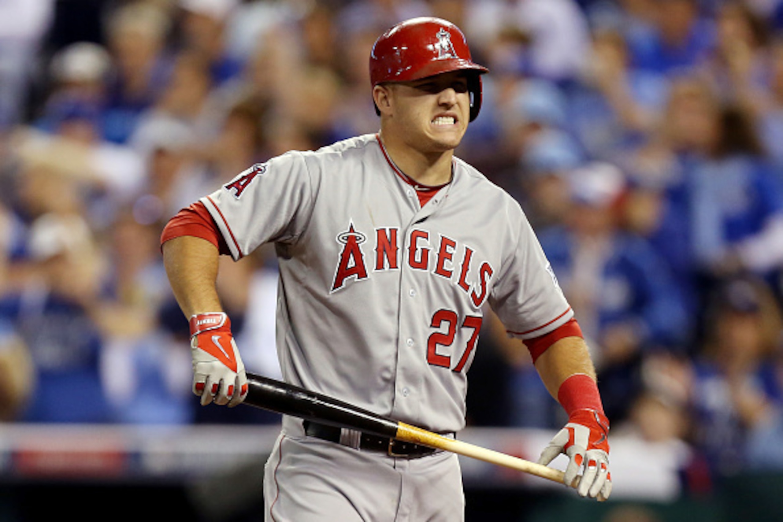KANSAS CITY, MO - OCTOBER 05: Mike Trout #27 of the Los Angeles Angels reacts after batting against the Kansas City Royals in the third inning during Game Three of the American League Division Series at Kauffman Stadium on October 5, 2014 in Kansas City, 