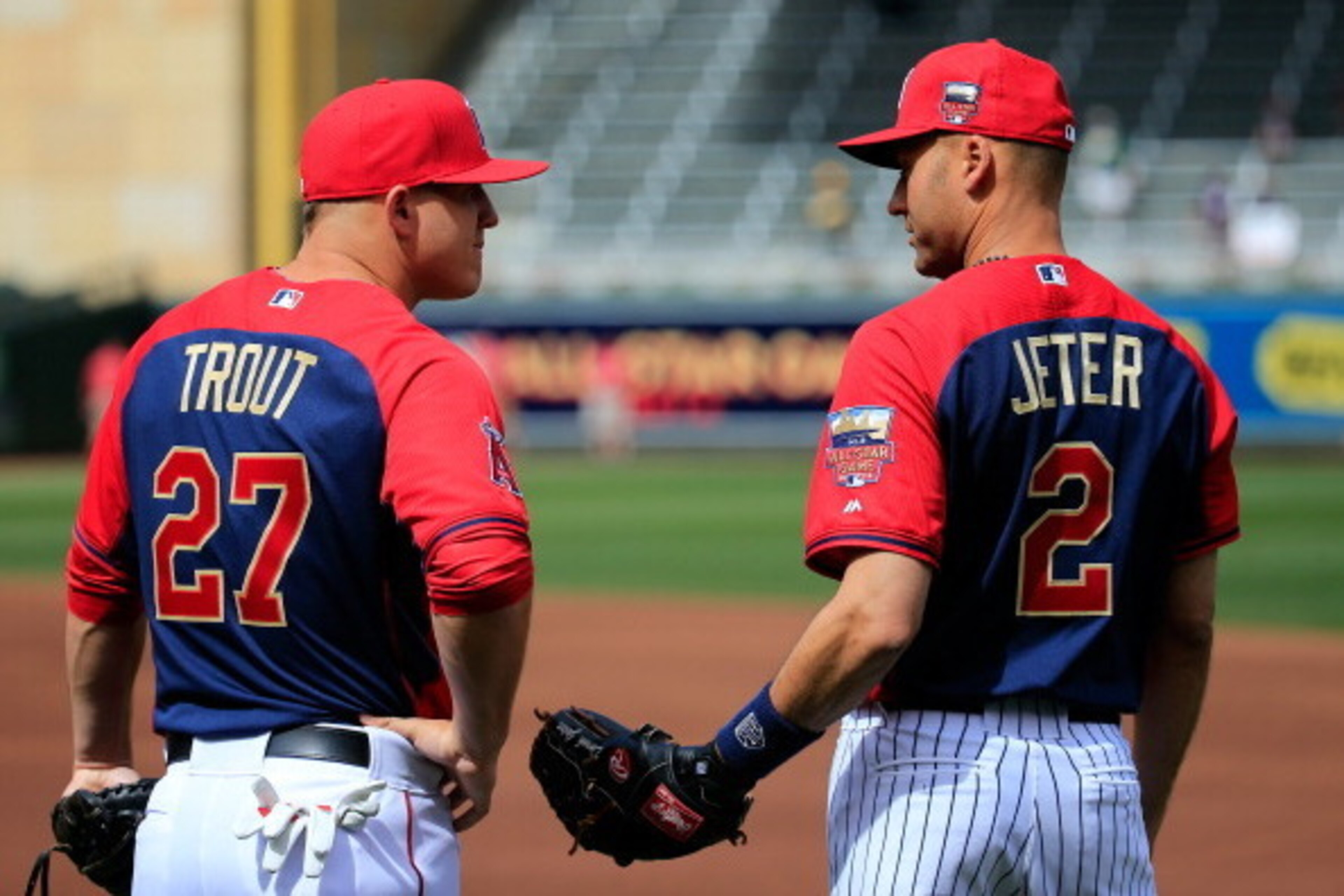 MINNEAPOLIS, MN - JULY 15:  American League All-Star Derek Jeter #2 of the New York Yankees speaks with American League All-Star Mike Trout #27 of the Los Angeles Angels during batting practice prior to the 85th MLB All-Star Game at Target Field on July 1