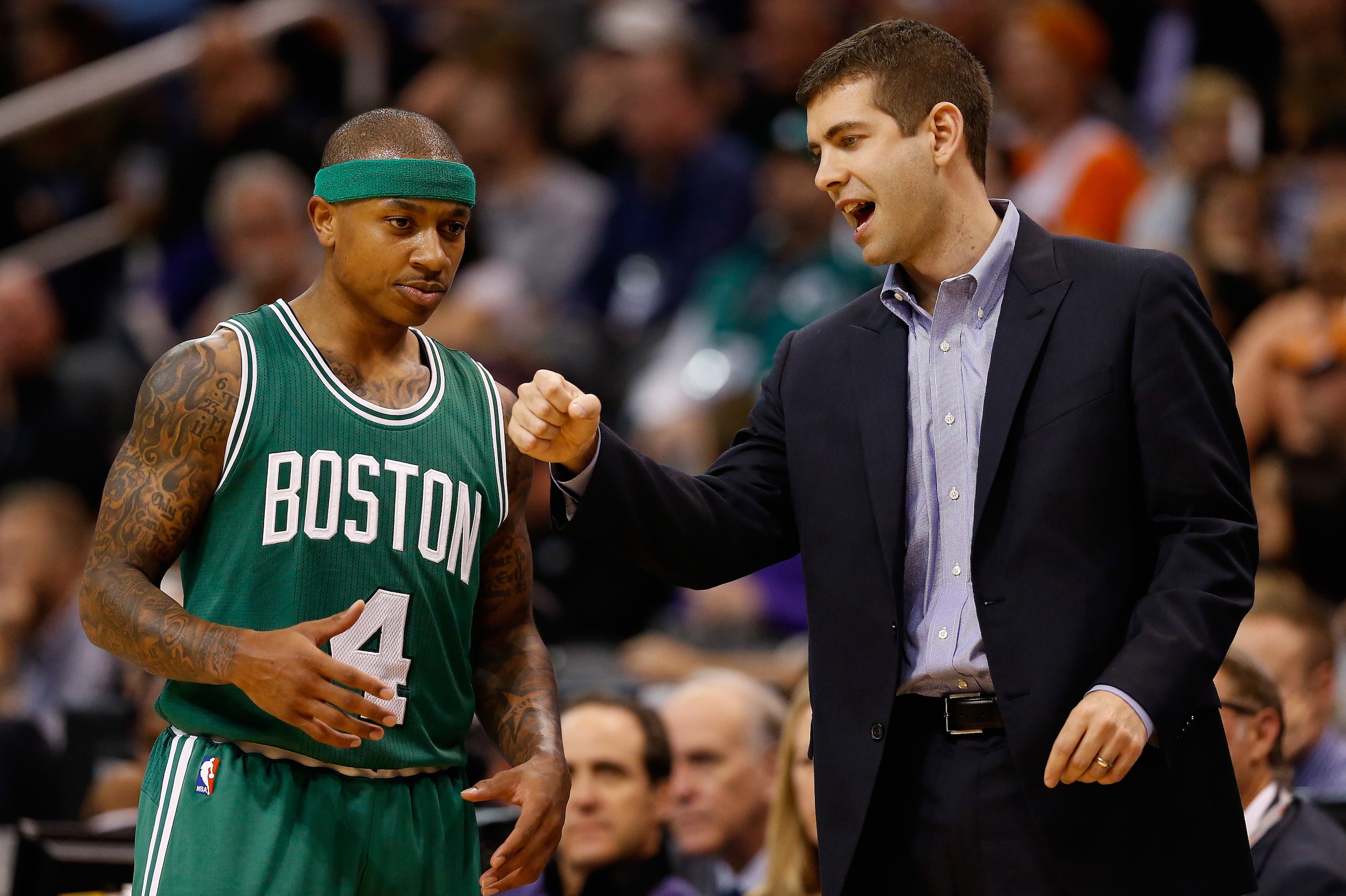 PHOENIX, AZ - FEBRUARY 23:  Head coach Brad Stevens of the Boston Celtics talks with Isaiah Thomas #4 during the second half of the NBA game against the Phoenix Suns at US Airways Center on February 23, 2015 in Phoenix, Arizona. The Celtics defeated the S