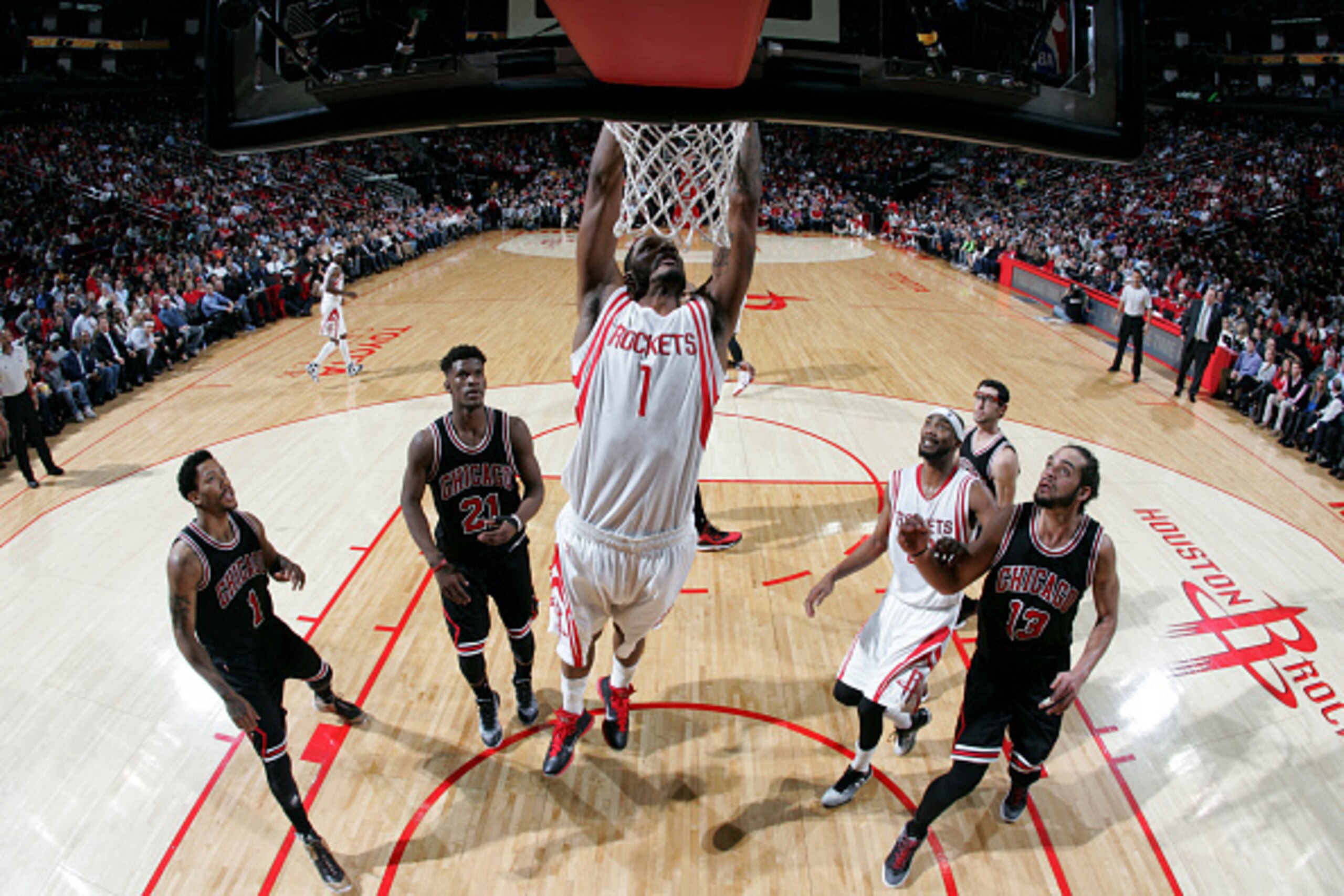 HOUSTON, TX - FEBRUARY 4: Trevor Ariza #1 of the Houston Rockets dunks against the Chicago Bulls on February 4, 2015 at the Toyota Center in Houston, Texas. NOTE TO USER: User expressly acknowledges and agrees that, by downloading and or using this photog