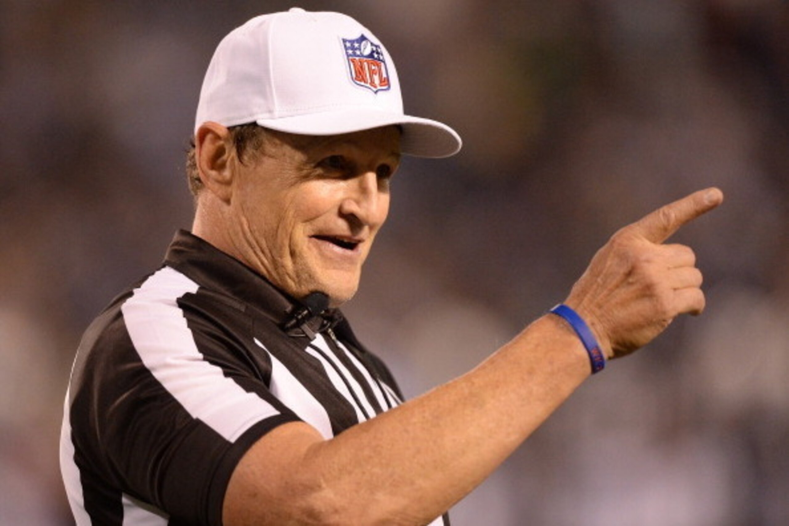 SAN DIEGO, CA - AUGUST 08:  Referee Ed Hochuli #85 jokes on the field during the game between the Seattle Seahawks and the San Diego Chargers at Qualcomm Stadium on August 8, 2013 in San Diego, California.  (Photo by Harry How/Getty Images)