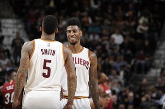 CLEVELAND, OH - FEBRUARY 11:  Iman Shumpert #4 and J.R. Smith #5 of the Cleveland Cavaliers during the game against the Miami Heat on February 11, 2015 at Quicken Loans Arena in Cleveland, Ohio. NOTE TO USER: User expressly acknowledges and agrees that, b