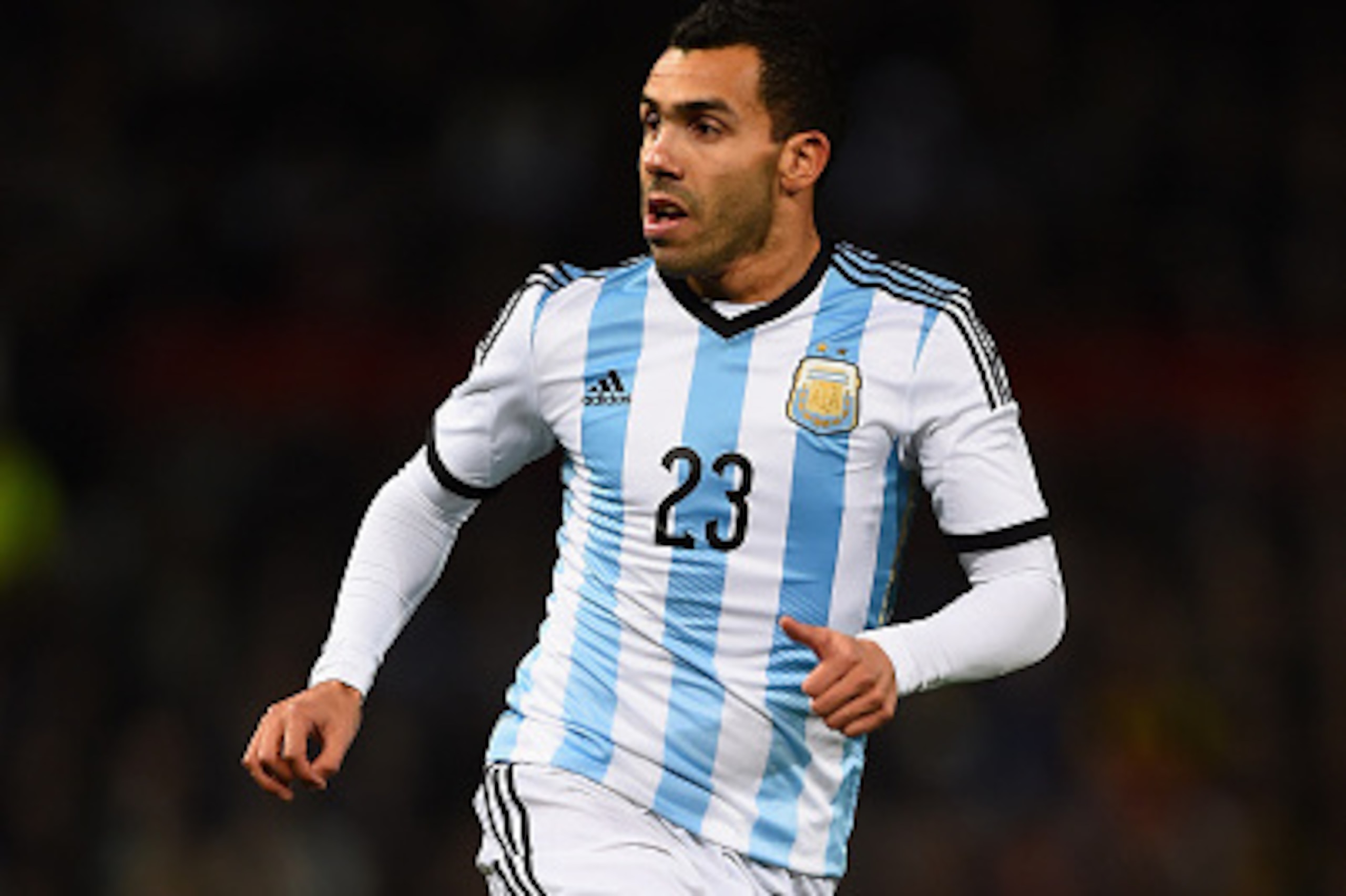 MANCHESTER, ENGLAND - NOVEMBER 18: Carlos Tevez of Argentina in action during the International Friendly match between Argentina and Portugal at Old Trafford on November 18, 2014 in Manchester, England. (Photo by Laurence Griffiths/Getty Images) MANCHESTER, ENGLAND - NOVEMBER 18: Carlos Tevez of Argentina in action during the International Friendly match between Argentina and Portugal at Old Trafford on November 18, 2014 in Manchester, England. (Photo by Laurence Griffiths/Getty Images)