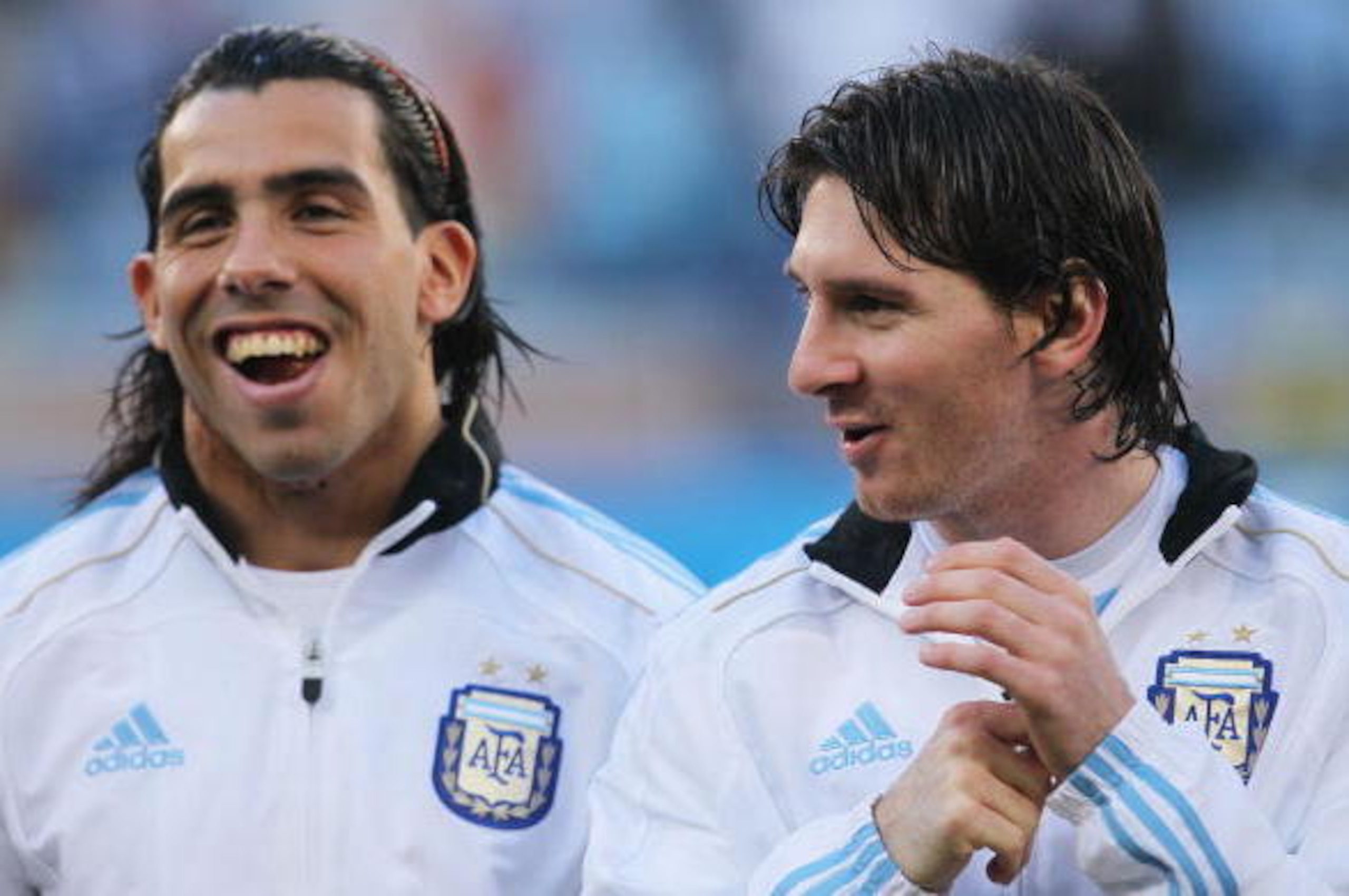 CAPE TOWN, SOUTH AFRICA - JULY 03: Carlos Tevez and Lionel Messi of Argentina share a joke ahead of the 2010 FIFA World Cup South Africa Quarter Final match between Argentina and Germany at Green Point Stadium on July 3, 2010 in Cape Town, South Africa. CAPE TOWN, SOUTH AFRICA - JULY 03: Carlos Tevez and Lionel Messi of Argentina share a joke ahead of the 2010 FIFA World Cup South Africa Quarter Final match between Argentina and Germany at Green Point Stadium on July 3, 2010 in Cape Town, South Africa.