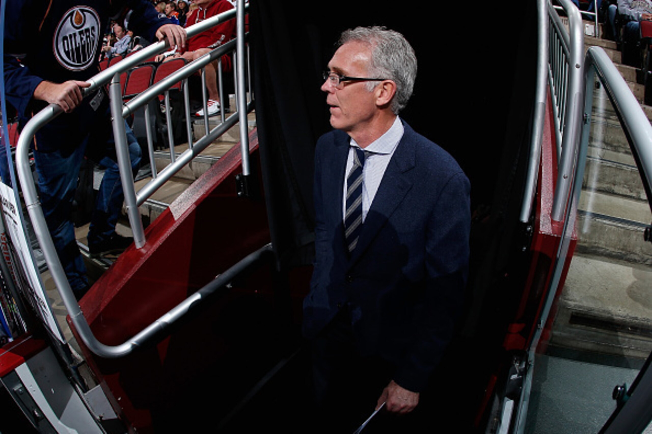 GLENDALE, AZ - DECEMBER 16:  General manager Craig MacTavish of the Edmonton Oilers walks out to the bench before the NHL game against the Arizona Coyotes at Gila River Arena on December 16, 2014 in Glendale, Arizona.  (Photo by Christian Petersen/Getty I