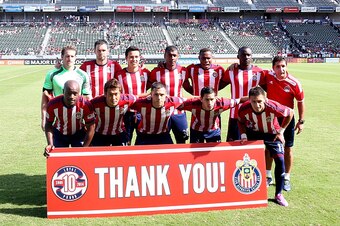 LOS ANGELES, CA - OCTOBER 26:   Chivas USA poses for a pregame tam photo in front of a sign thanking fans for 10 years of support before playing the San Jose Earthquakes at StubHub Center on October 26, 2014 in Los Angeles, California.  the game was the t