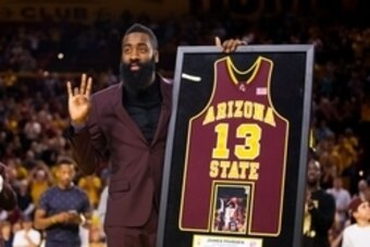 Feb 18, 2015; Tempe, AZ, USA; Arizona State Sun Devils former guard James Harden reacts as he has his number retired during a halftime ceremony against the UCLA Bruins at Wells-Fargo Arena. Mandatory Credit: Mark J. Rebilas-USA TODAY Sports