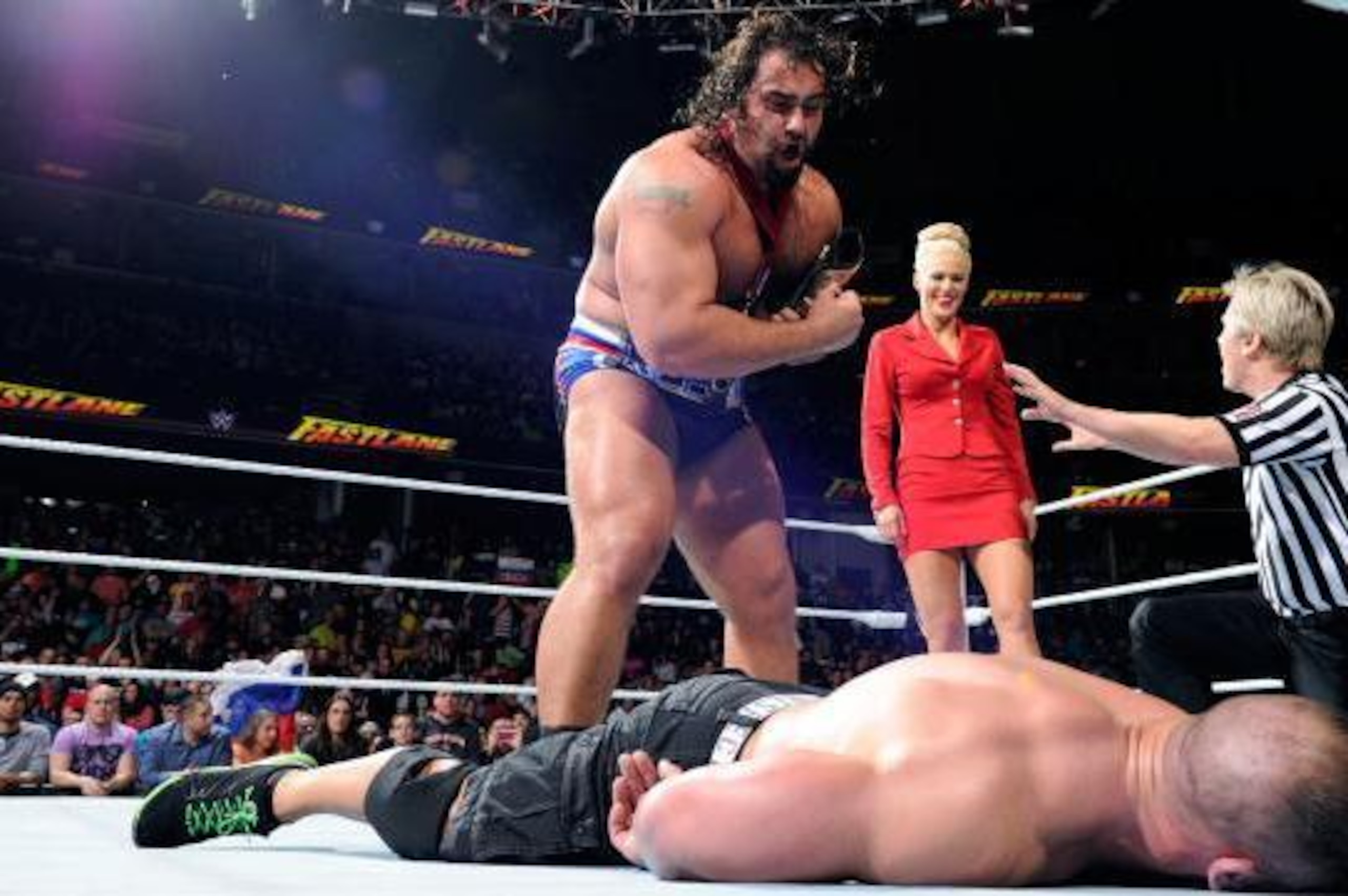 Rusev taunts John Cena after his win.