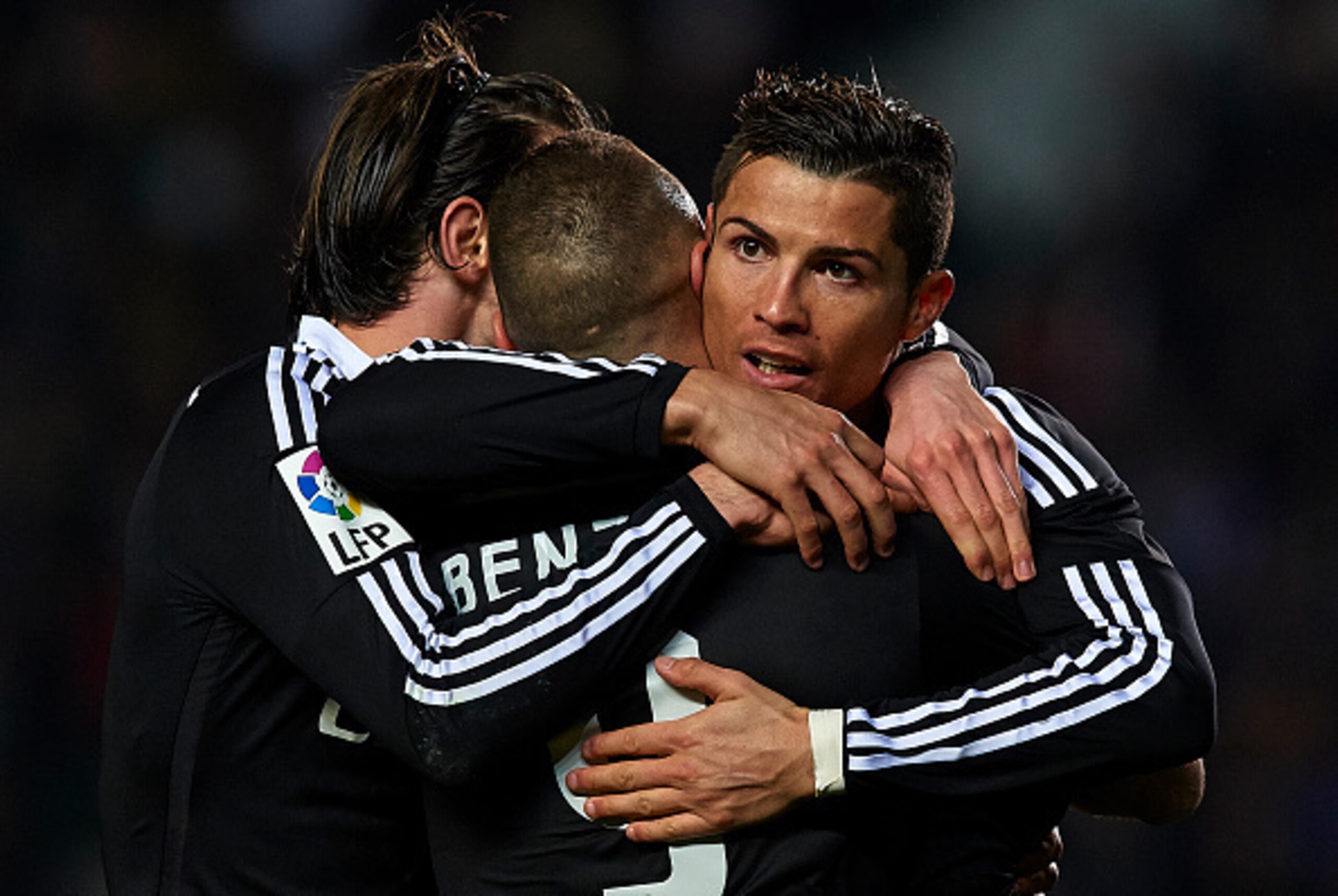 ELCHE, SPAIN - FEBRUARY 22: Karim Benzema of Real Madrid celebrates after scoring with his teammates Cristiano Ronaldo (R) and Gareth Bale during the La Liga match between Elche FC and Real Madrid at Estadio Manuel Martinez Valero on February 22, 2015 in ELCHE, SPAIN - FEBRUARY 22: Karim Benzema of Real Madrid celebrates after scoring with his teammates Cristiano Ronaldo (R) and Gareth Bale during the La Liga match between Elche FC and Real Madrid at Estadio Manuel Martinez Valero on February 22, 2015 in