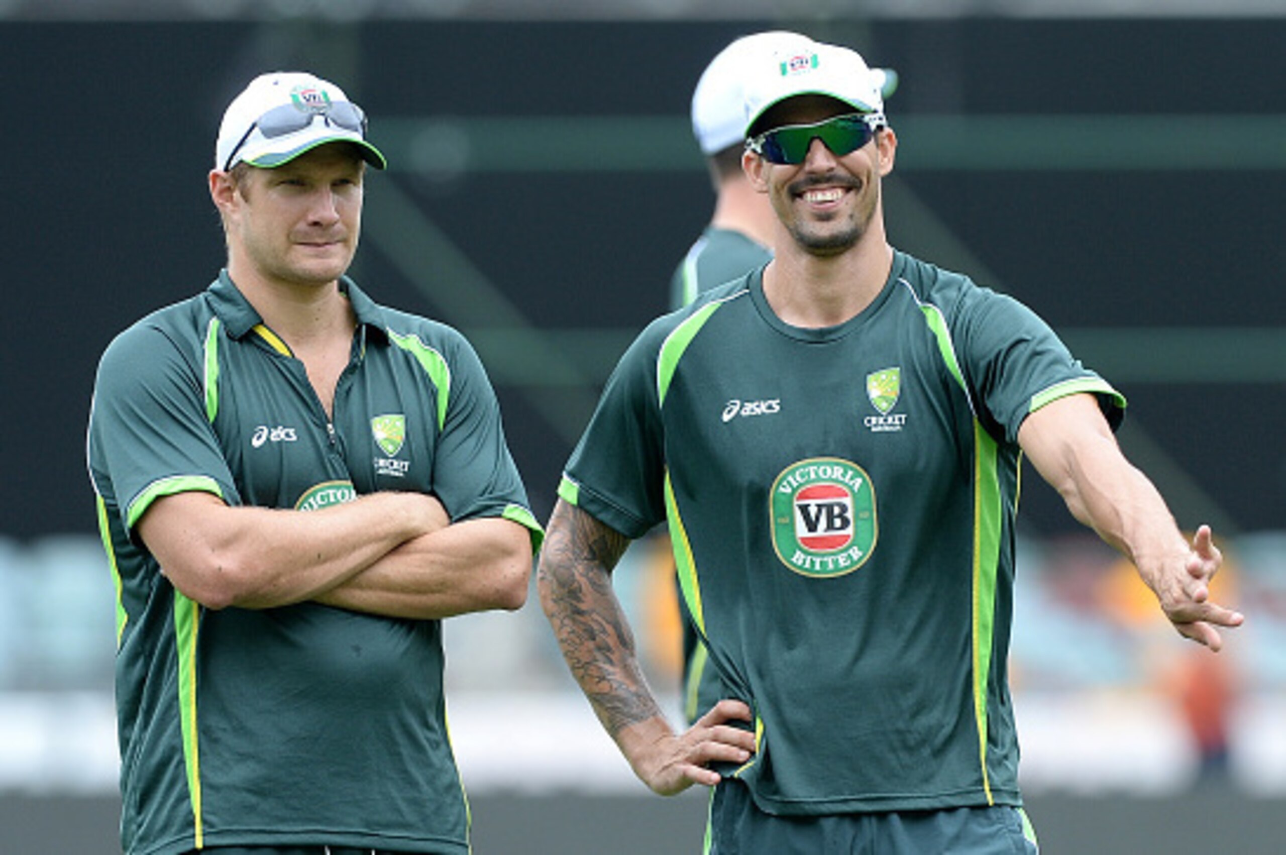 BRISBANE, AUSTRALIA - FEBRUARY 19: Shane Watson and Mitchell Johnson share a laugh during an Australian training session at The Gabba on February 19, 2015 in Brisbane, Australia.  (Photo by Bradley Kanaris/Getty Images)