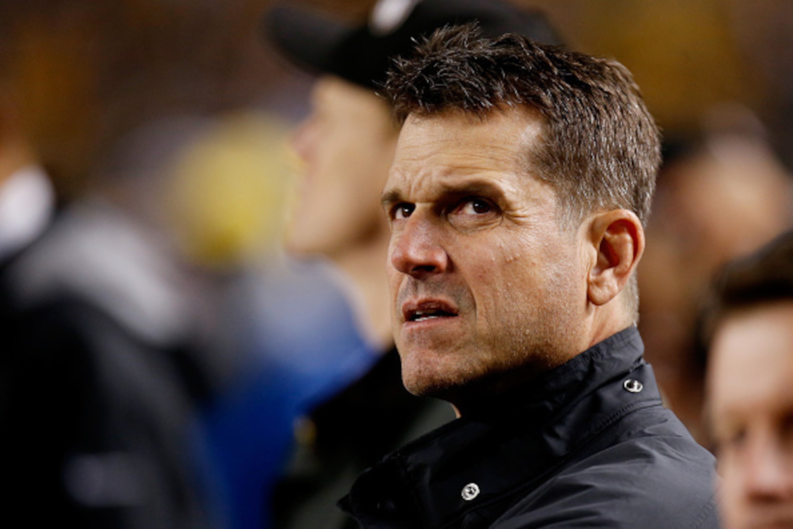 PITTSBURGH, PA - JANUARY 03:  Michigan head coach Jim Harbaugh attends the AFC Wild Card game between the Pittsburgh Steelers and the Baltimore Ravens at Heinz Field on January 3, 2015 in Pittsburgh, Pennsylvania.  (Photo by Gregory Shamus/Getty Images)