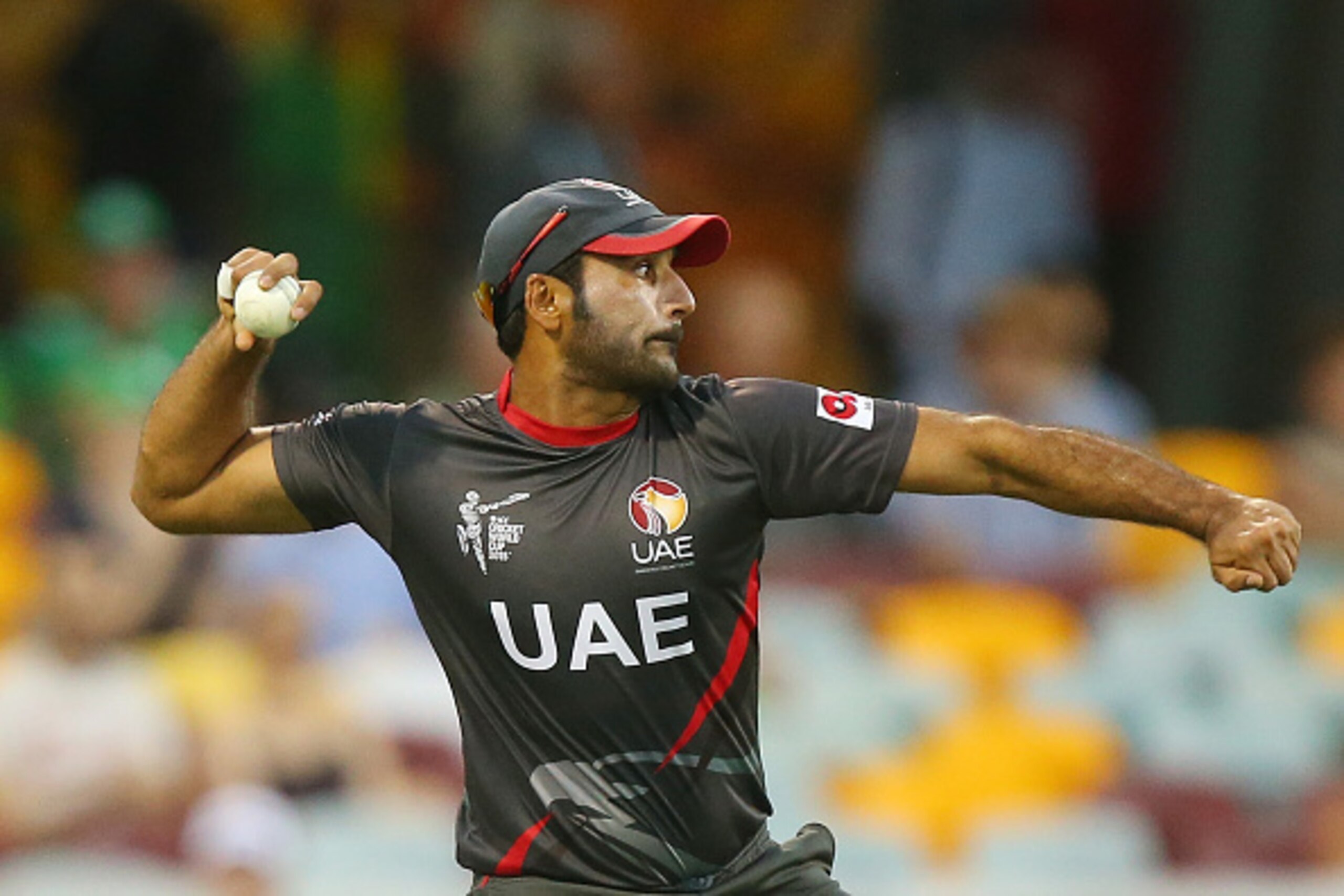 BRISBANE, AUSTRALIA - FEBRUARY 25:  Amjad Ali of the United Arab Emirates fields during the 2015 ICC Cricket World Cup match between Ireland and the United Arab Emirates at The Gabba on February 25, 2015 in Brisbane, Australia.  (Photo by Chris Hyde/Getty