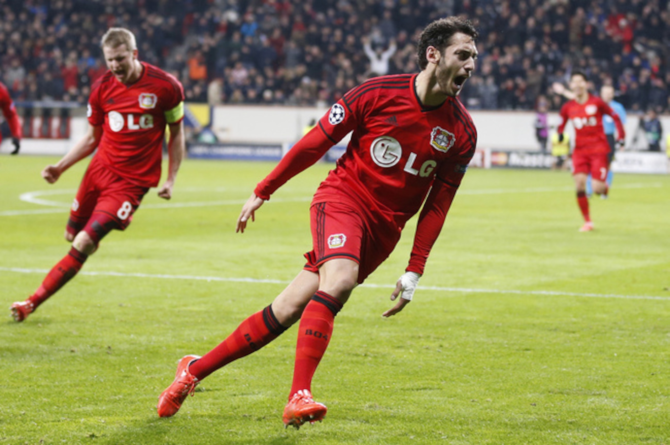 Hakan Calhanoglu celebrates scoring Bayer Leverkusen's winning goal. Hakan Calhanoglu celebrates scoring Bayer Leverkusen's winning goal.