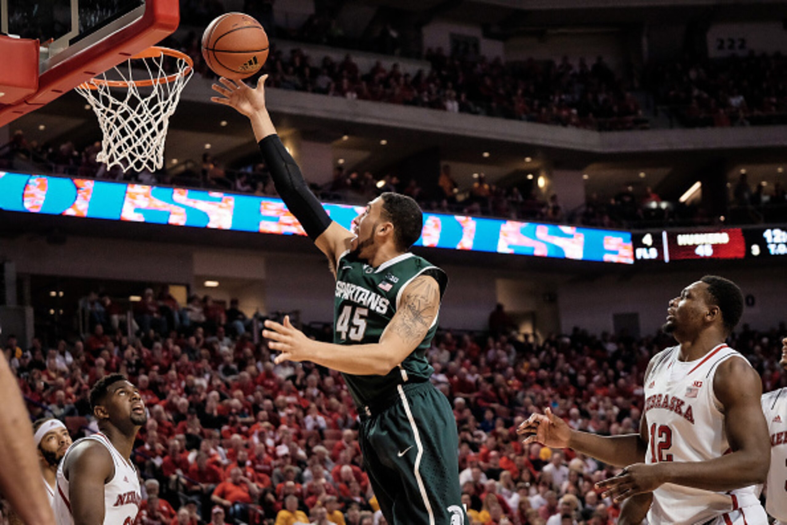 LINCOLN, NE - JANUARY 24: Denzel Valentine #45 of the Michigan State Spartans shoots the ball during their game against the Michigan State Spartans at Pinnacle Bank Arena January 24, 2015 in Lincoln, Nebraska. (Photo by Eric Francis/Getty Images) LINCOLN, NE - JANUARY 24: Denzel Valentine #45 of the Michigan State Spartans shoots the ball during their game against the Michigan State Spartans at Pinnacle Bank Arena January 24, 2015 in Lincoln, Nebraska. (Photo by Eric Francis/Getty Images)