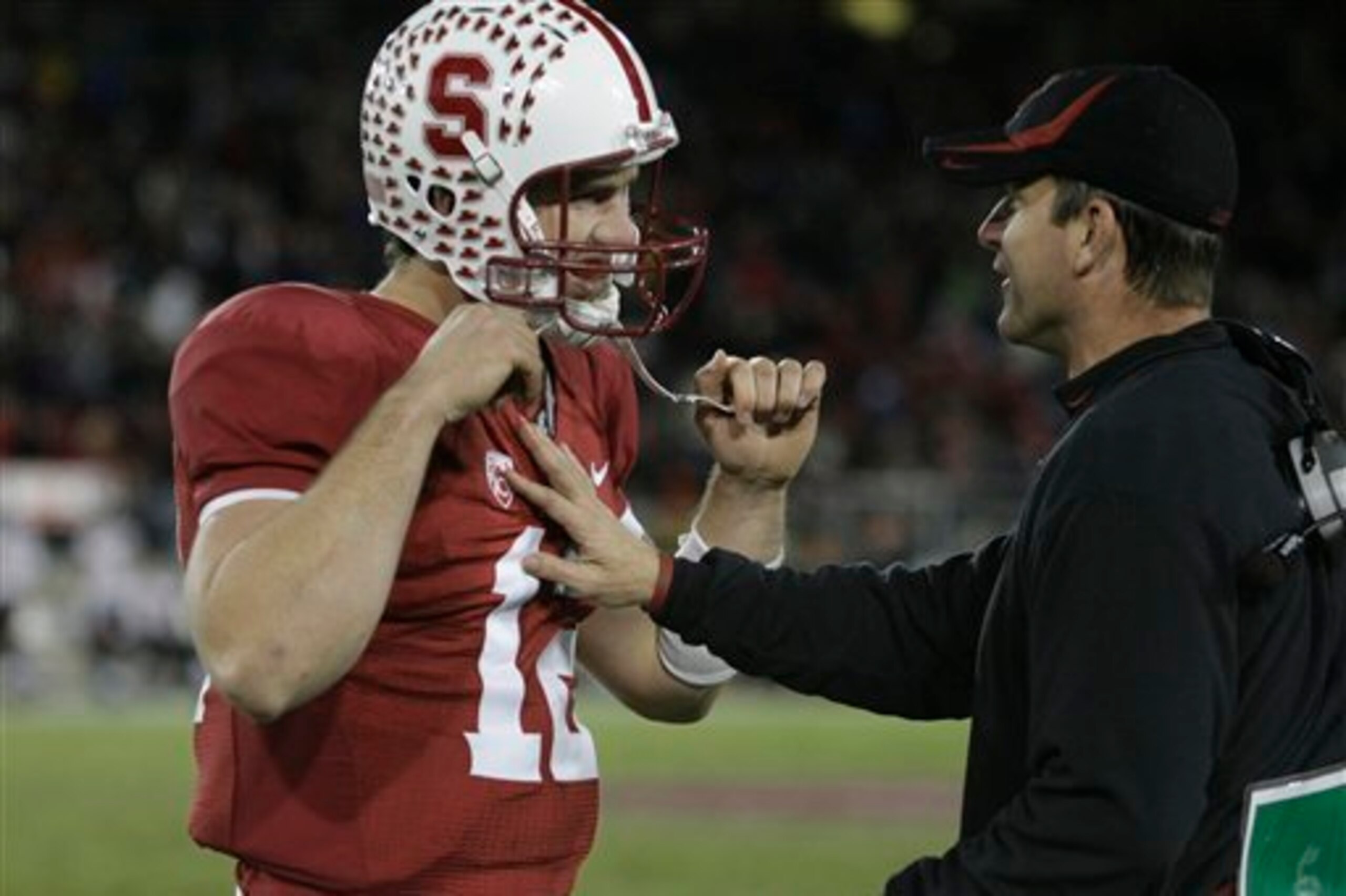 Jim Harbaugh along with Andrew Luck at Stanford.