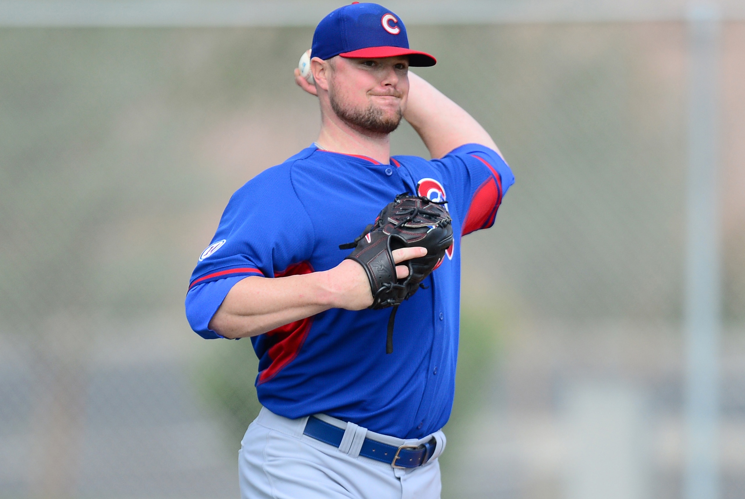 Feb 22, 2015; Mesa, AZ, USA; Chicago Cubs starting pitcher Jon Lester (34) throws during a workout at Sloan Park. Mandatory Credit: Joe Camporeale-USA TODAY Sports Feb 22, 2015; Mesa, AZ, USA; Chicago Cubs starting pitcher Jon Lester (34) throws during a workout at Sloan Park. Mandatory Credit: Joe Camporeale-USA TODAY Sports