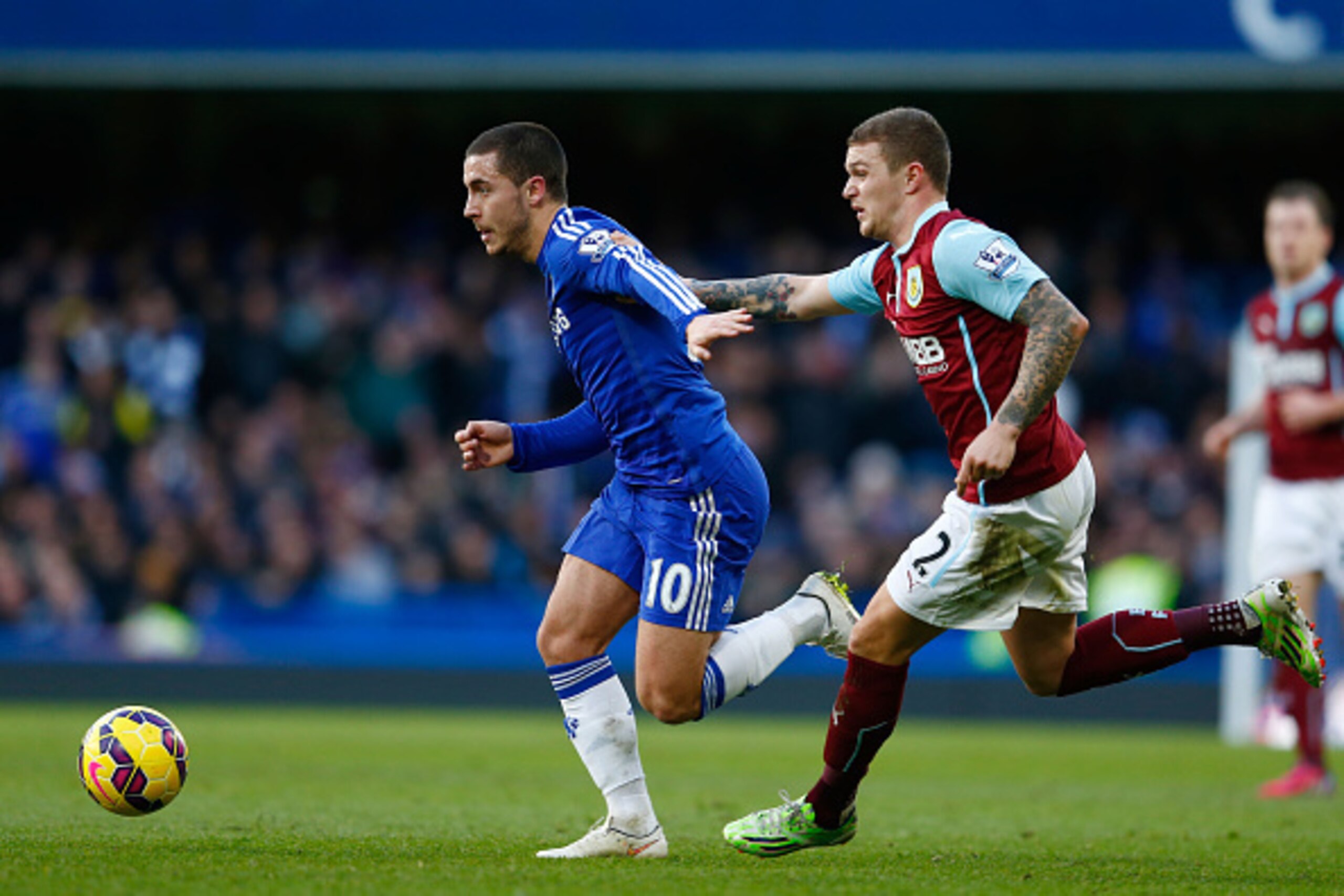 LONDON, ENGLAND - FEBRUARY 21:  Eden Hazard of Chelsea is challenged by Kieran Trippier of Burnley uring the Barclays Premier League match between Chelsea and Burnley at Stamford Bridge on February 21, 2015 in London, England.  (Photo by Julian Finney/Get