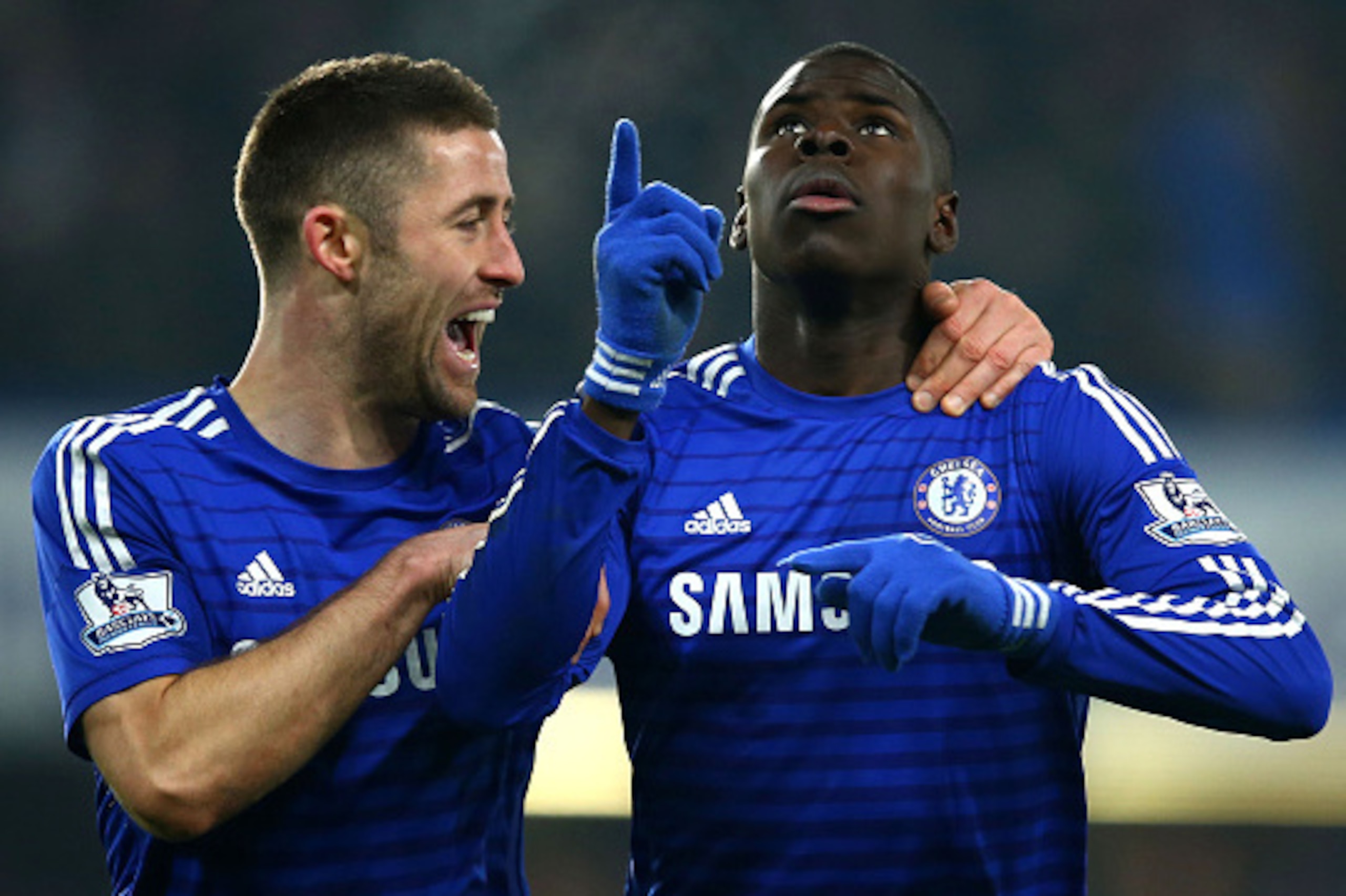 LONDON, ENGLAND - JANUARY 04:  Kurt Zouma of Chelsea (R) celebrates with Gary Cahill (L) as he scores their third goal during the FA Cup Third Round match between Chelsea and Watford at Stamford Bridge on January 4, 2015 in London, England.  (Photo by Ric
