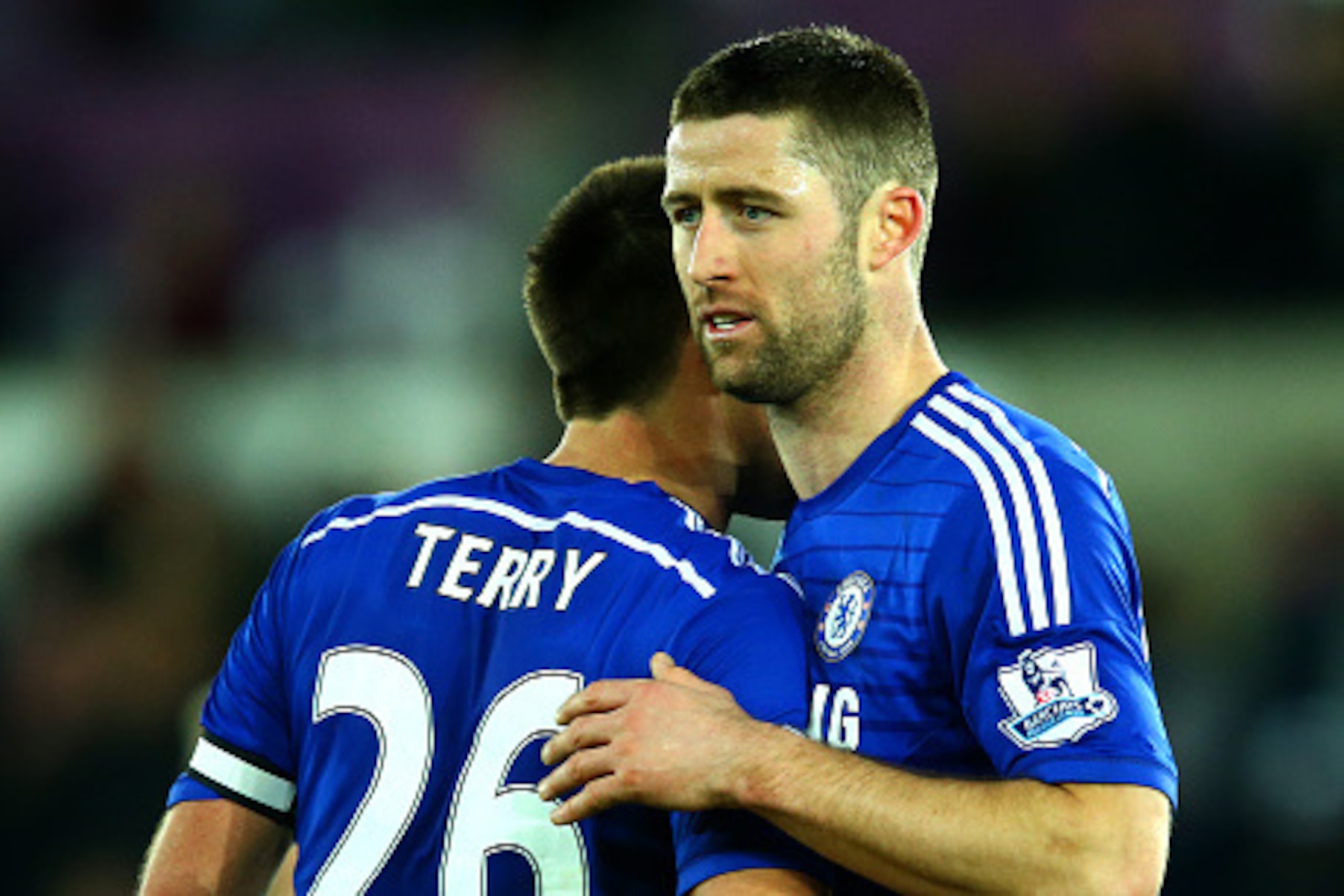 SWANSEA, WALES - JANUARY 17:  Gary Cahill and John Terry of Chelsea speak congratulate each other after the Barclays Premier League match between Swansea City and Chelsea at Liberty Stadium on January 17, 2015 in Swansea, Wales.  (Photo by Richard Heathco