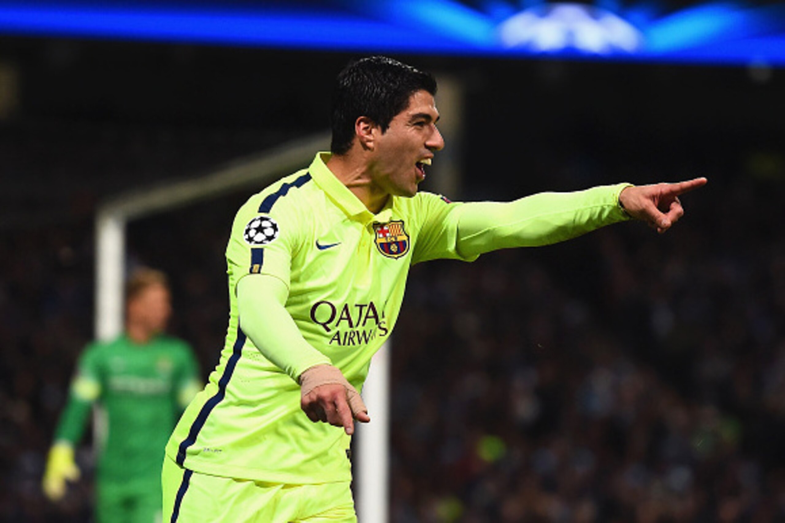 MANCHESTER, ENGLAND - FEBRUARY 24:  Luis Suarez of Barcelona celebrates scoring their second goal during the UEFA Champions League Round of 16 match between Manchester City and Barcelona at Etihad Stadium on February 24, 2015 in Manchester, United Kingdom
