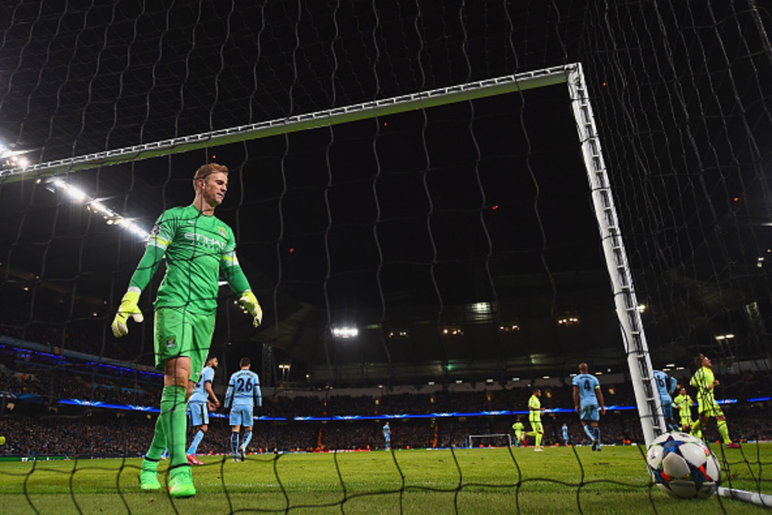 MANCHESTER, ENGLAND - FEBRUARY 24:  Joe Hart of Manchester City shows his frustration after Luis Suarez of Barcelona (not pictured) scored a second goal during the UEFA Champions League Round of 16 match between Manchester City and Barcelona at Etihad Sta