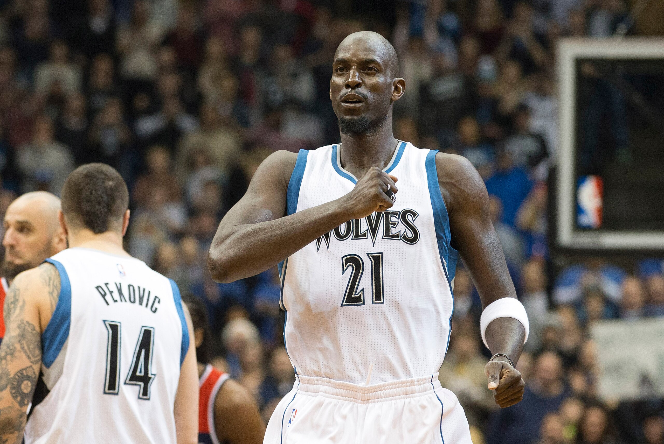 Feb 25, 2015; Minneapolis, MN, USA; Minnesota Timberwolves forward Kevin Garnett (21) pounds his chest before a game against the Washington Wizards at Target Center. Mandatory Credit: Jesse Johnson-USA TODAY Sports