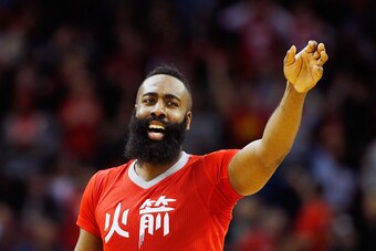 HOUSTON, TX - FEBRUARY 25:  James Harden #13 of the Houston Rockets reacts to a play during their game against the Los Angeles Clippers at the Toyota Center on February 25, 2015 in Houston, Texas. NOTE TO USER: User expressly acknowledges and agrees that,