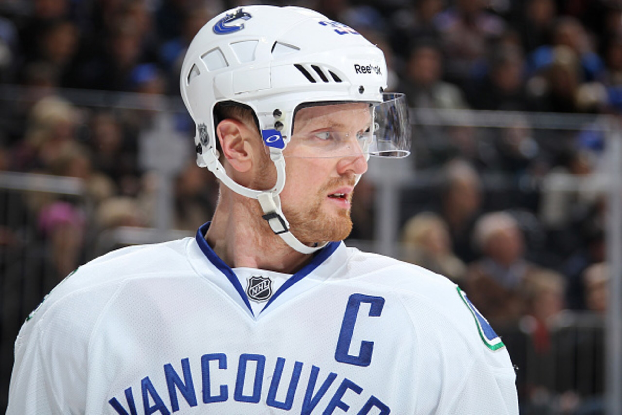 NEW YORK, NY - FEBRUARY 19:  Henrik Sedin #33 of the Vancouver Canucks looks on during a face-off against the New York Rangers at Madison Square Garden on February 19, 2015 in New York City. The Vancouver Canucks won 5-4 in a shootout. (Photo by Jared Sil