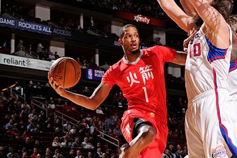 HOUSTON, TX - FEBRUARY 25:  Trevor Ariza #1 of the Houston Rockets looks to pass against the Los Angeles Clippers during the game on February 25, 2015 at the Toyota Center in Houston, Texas. NOTE TO USER: User expressly acknowledges and agrees that, by do