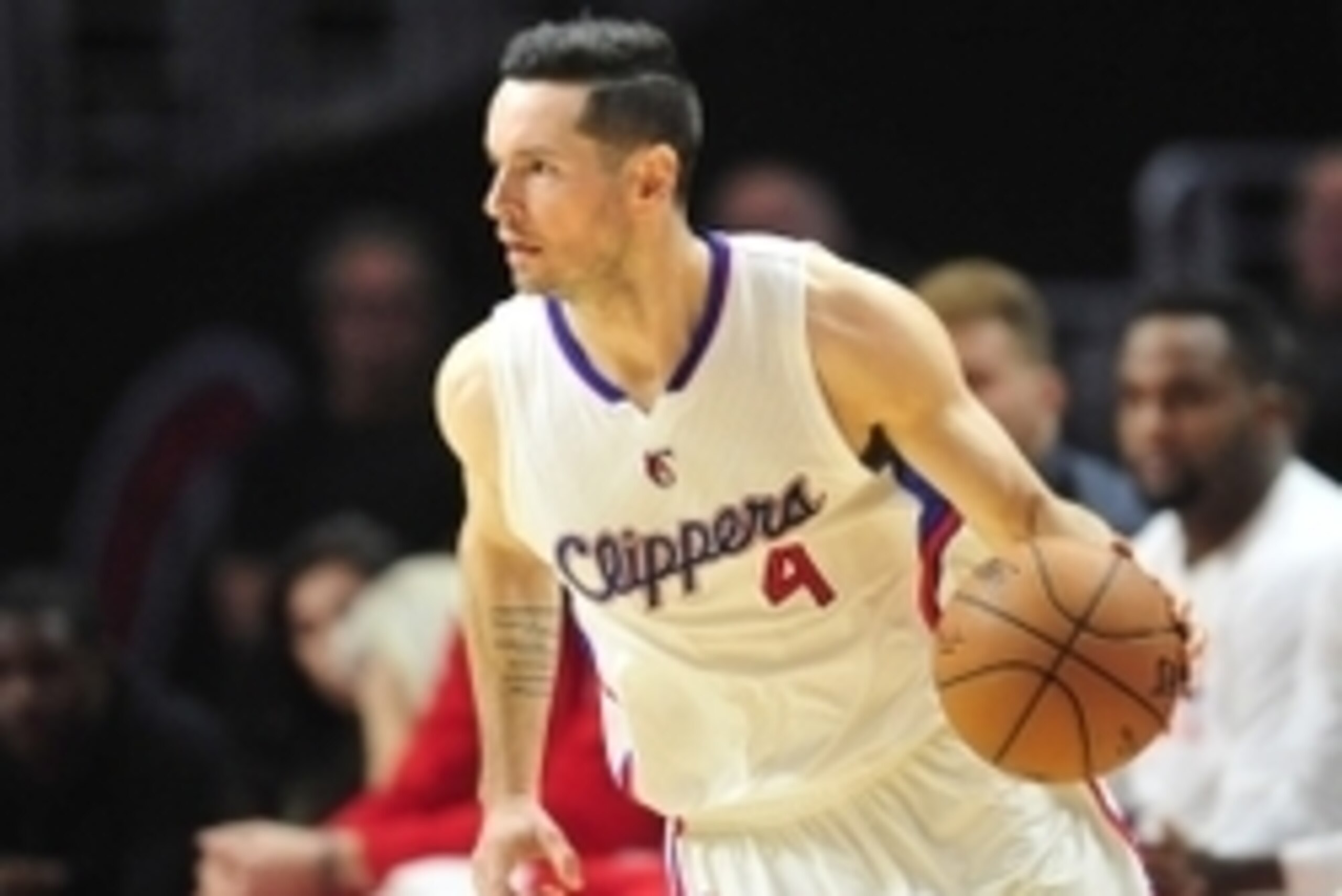 February 19, 2015; Los Angeles, CA, USA; Los Angeles Clippers guard J.J. Redick (4) moves the ball against the San Antonio Spurs during the second half at Staples Center. Mandatory Credit: Gary A. Vasquez-USA TODAY Sports