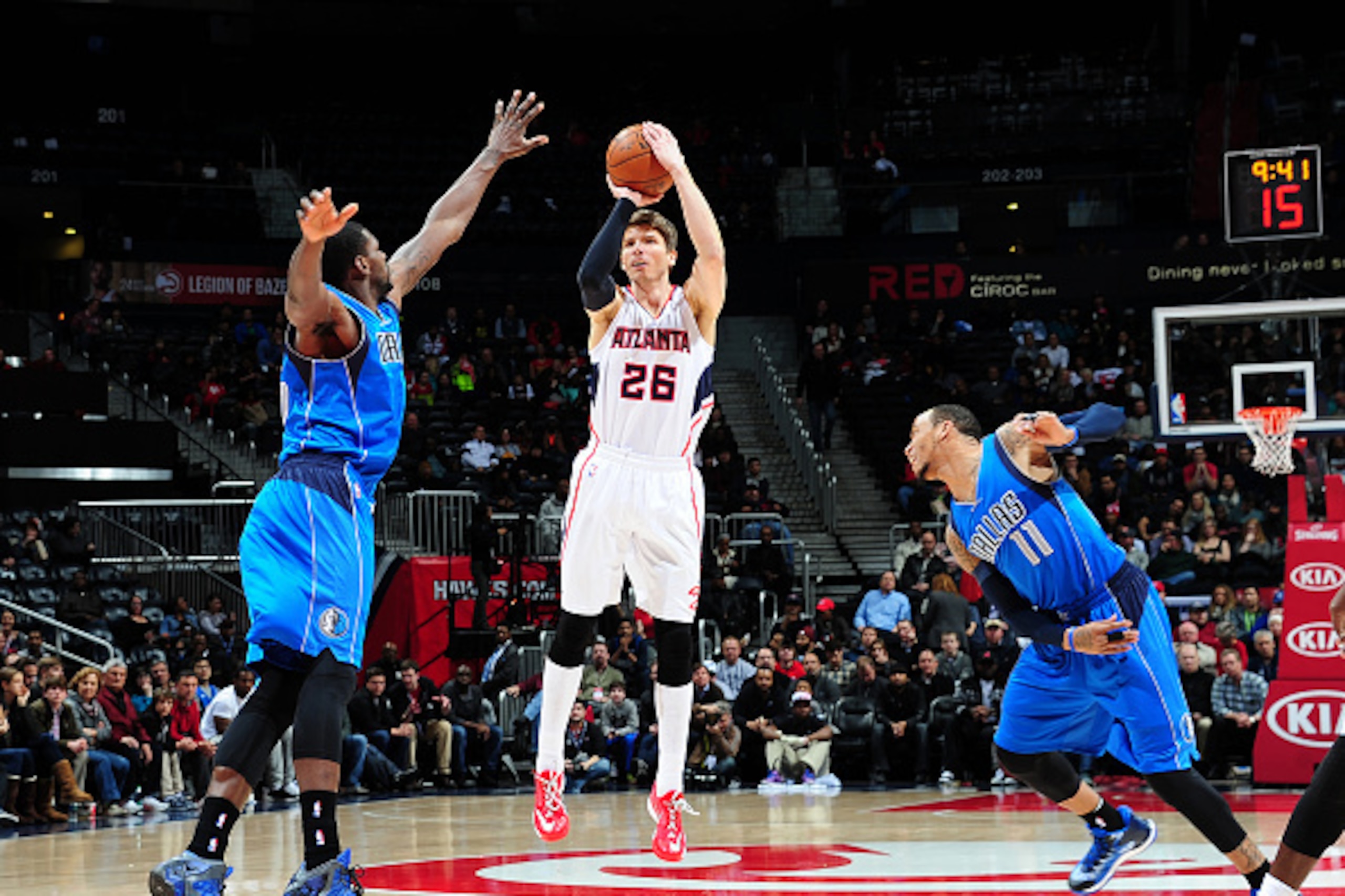 ATLANTA, GA - FEBRUARY 25: Kyle Korver #26 of the Atlanta Hawks puts up a shot against the Dallas Mavericks on February 25, 2015 at Philips Arena in Atlanta, Georgia.  NOTE TO USER: User expressly acknowledges and agrees that, by downloading and/or using 