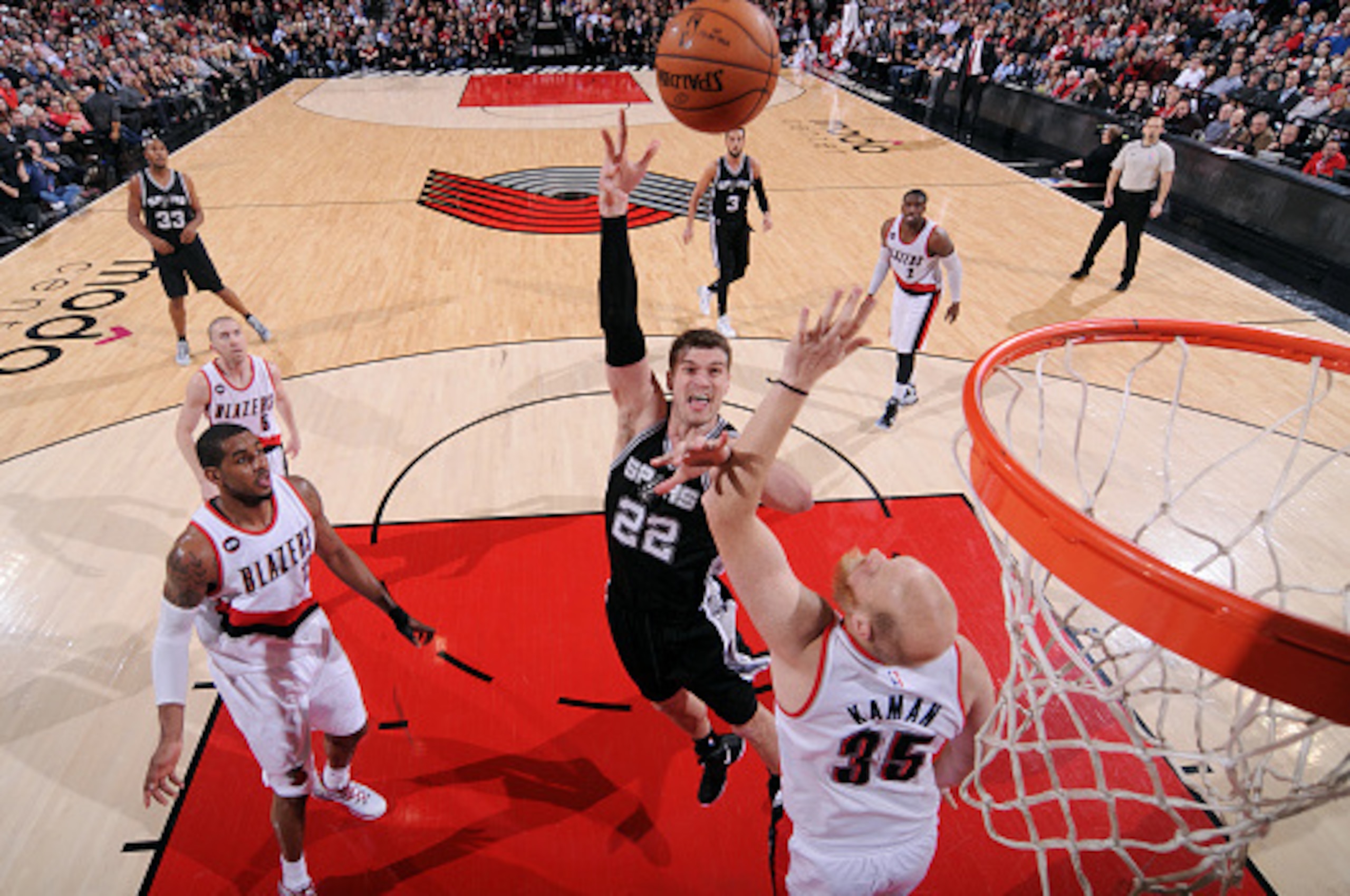 PORTLAND, OR - FEBRUARY 25: Tiago Splitter #22 of the San Antonio Spurs shoots against the Portland Trail Blazers on February 25, 2015 at the Moda Center in Portland, Oregon. NOTE TO USER: User expressly acknowledges and agrees that, by downloading and or