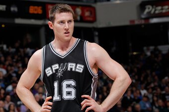 SACRAMENTO, CA - NOVEMBER 15: Aron Baynes #16 of the San Antonio Spurs stands on the court during the game against the Sacramento Kings on November 15, 2014 at Sleep Train Arena in Sacramento, California. NOTE TO USER: User expressly acknowledges and agre