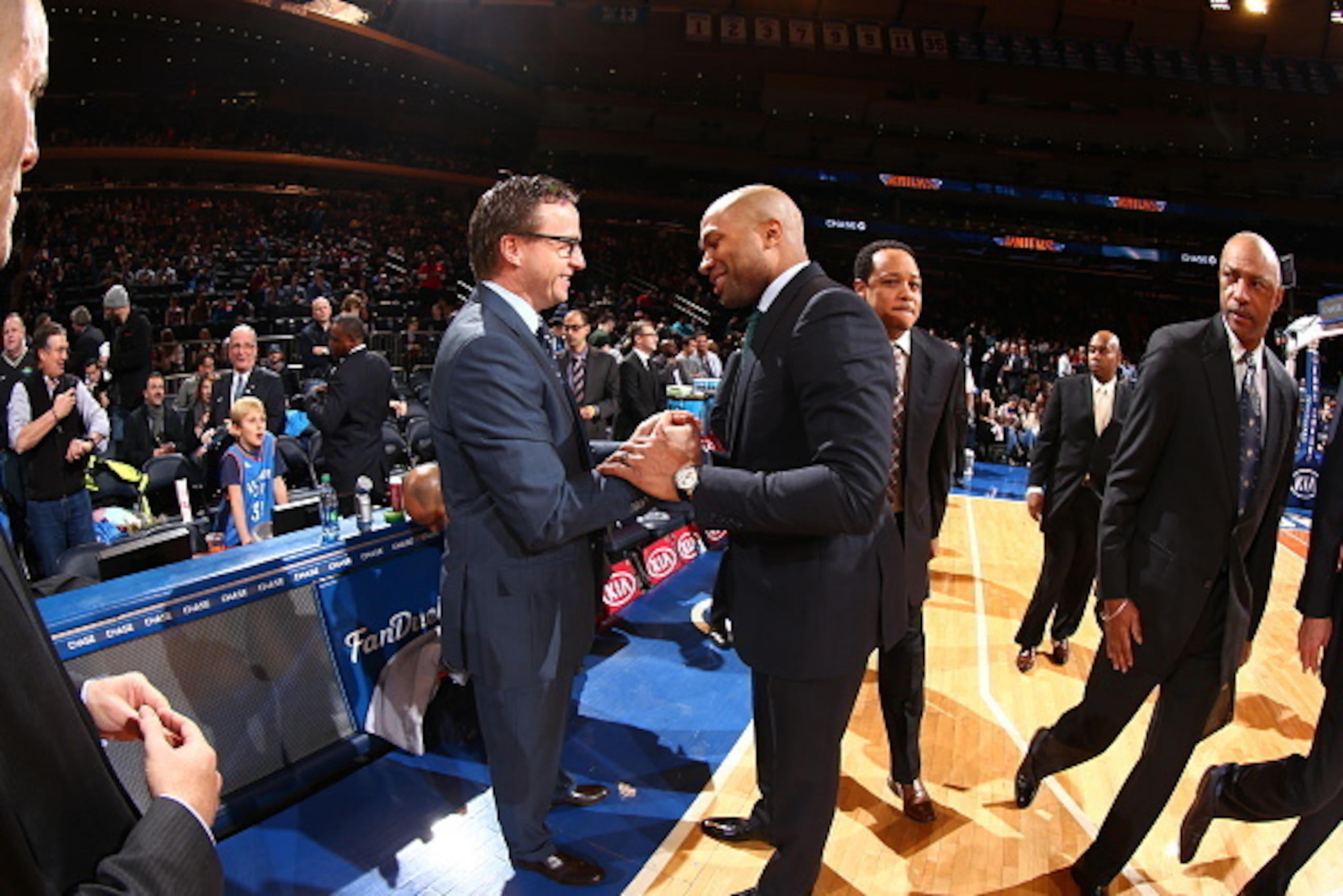 NEW YORK, NY - JANUARY 28:  Head coach Scott Brooks of the Oklahoma City Thunder and head coach Derek Fisher of the New York Knicks greet each other before the game on January 28, 2015 at Madison Square Garden in New York City, New York.  NOTE TO USER: Us