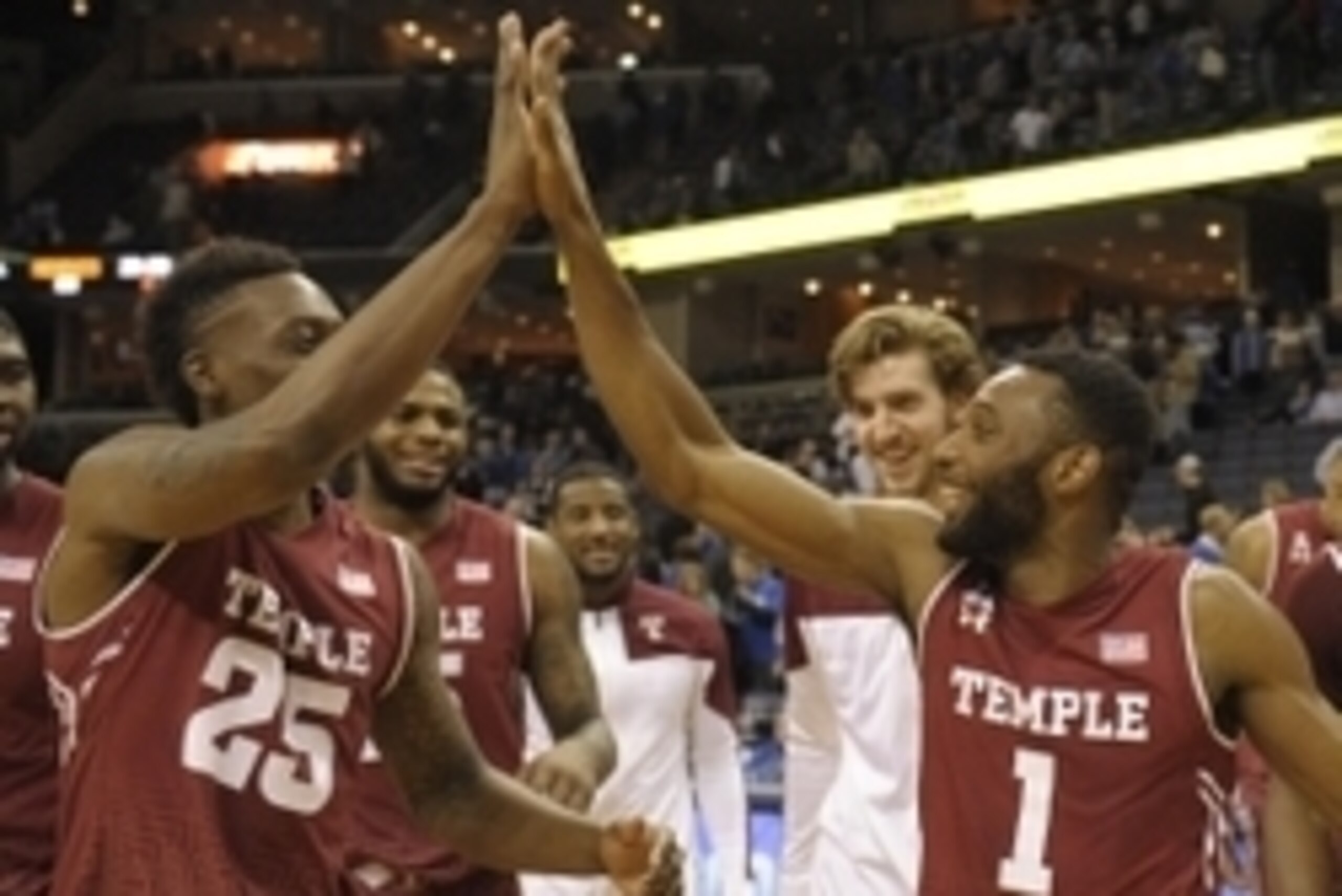 Feb 7, 2015; Memphis, TN, USA; Temple Owls celebrates after the game against the Memphis Tigers at FedExForum. Temple Owls beat Memphis Tigers 61 - 60. Mandatory Credit: Justin Ford-USA TODAY Sports Feb 7, 2015; Memphis, TN, USA; Temple Owls celebrates after the game against the Memphis Tigers at FedExForum. Temple Owls beat Memphis Tigers 61 - 60. Mandatory Credit: Justin Ford-USA TODAY Sports