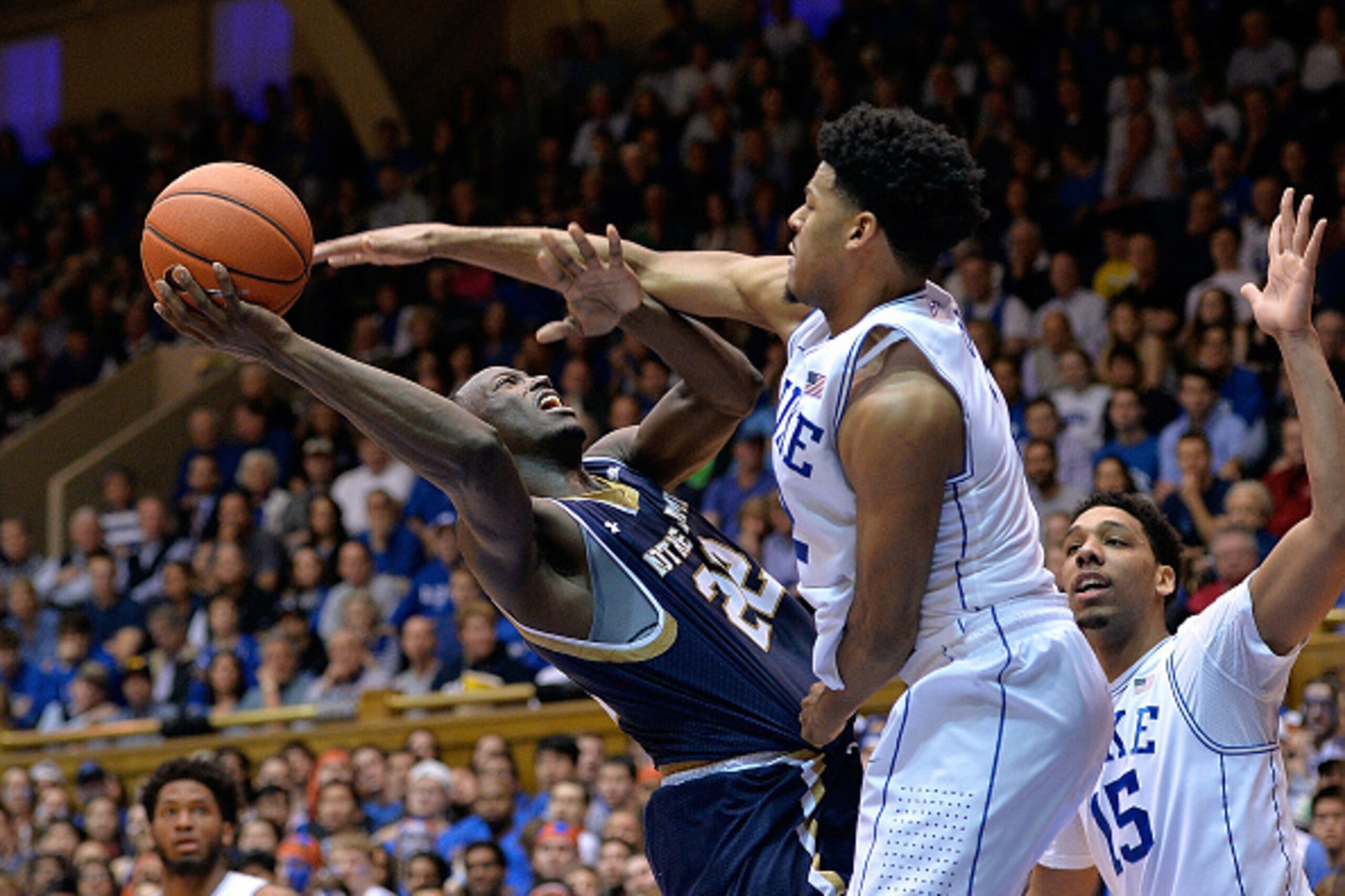 DURHAM, NC - FEBRUARY 07:  Quinn Cook #2 of the Duke Blue Devils defends a shot by Jerian Grant #22 of the Notre Dame Fighting Irish during their game at Cameron Indoor Stadium on February 7, 2015 in Durham, North Carolina. Duke won 90-60.  (Photo by Gran