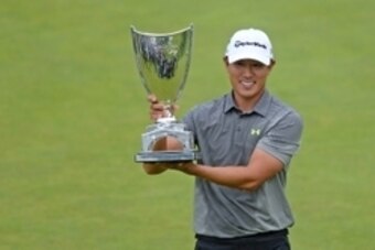 Feb 22, 2015; Pacific Palisades, CA, USA; James Hahn poses with the Northern Trust Open trophy after winning the tournament at Riviera Country Club. Mandatory Credit: Jake Roth-USA TODAY Sports