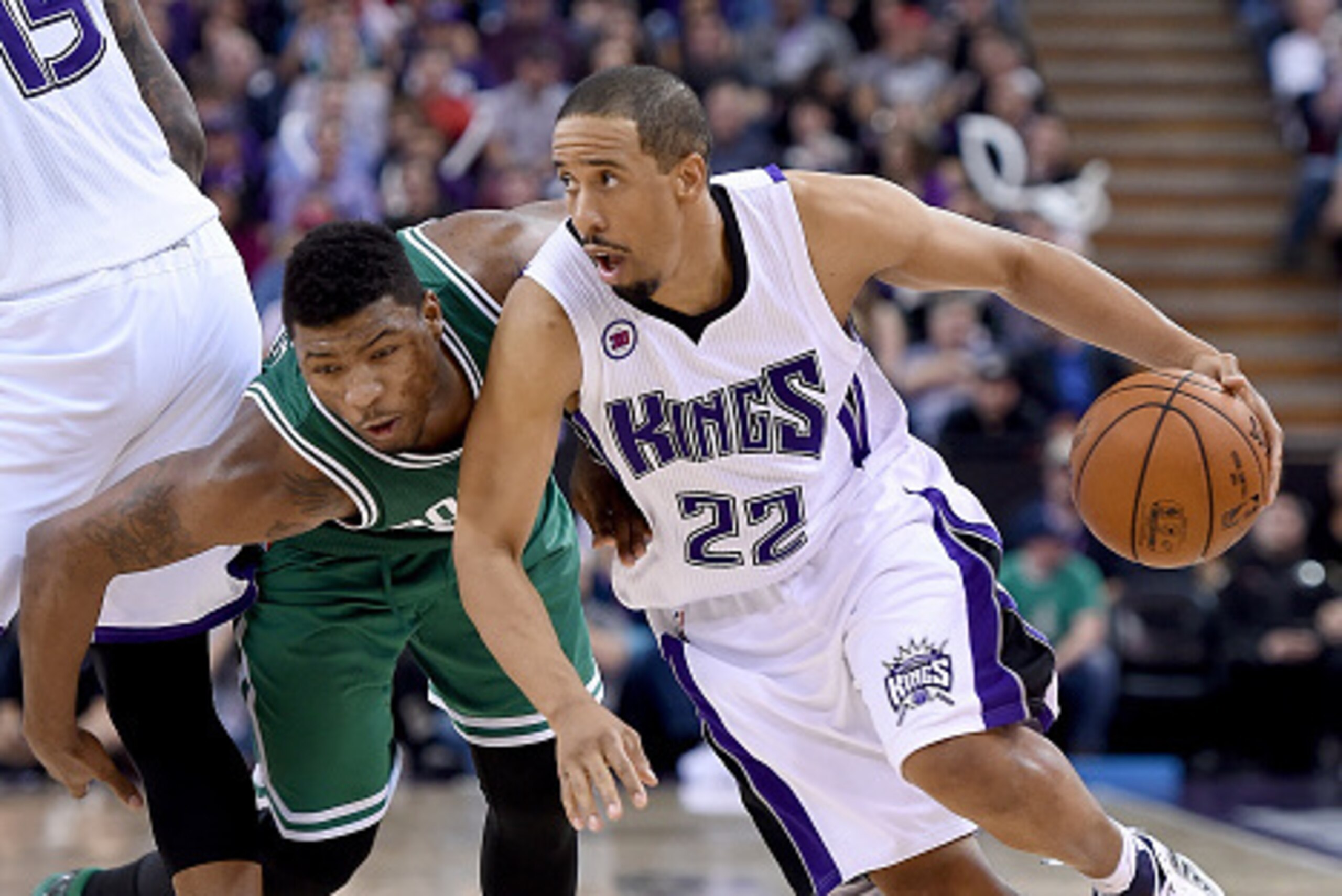 SACRAMENTO, CA - FEBRUARY 20: Andre Miller #22 of the Sacramento Kings drives past Marcus Smart #36 of the Boston Celtics in the fourth quarter at Sleep Train Arena on February 20, 2015 in Sacramento, California. NOTE TO USER: User expressly acknowledges 