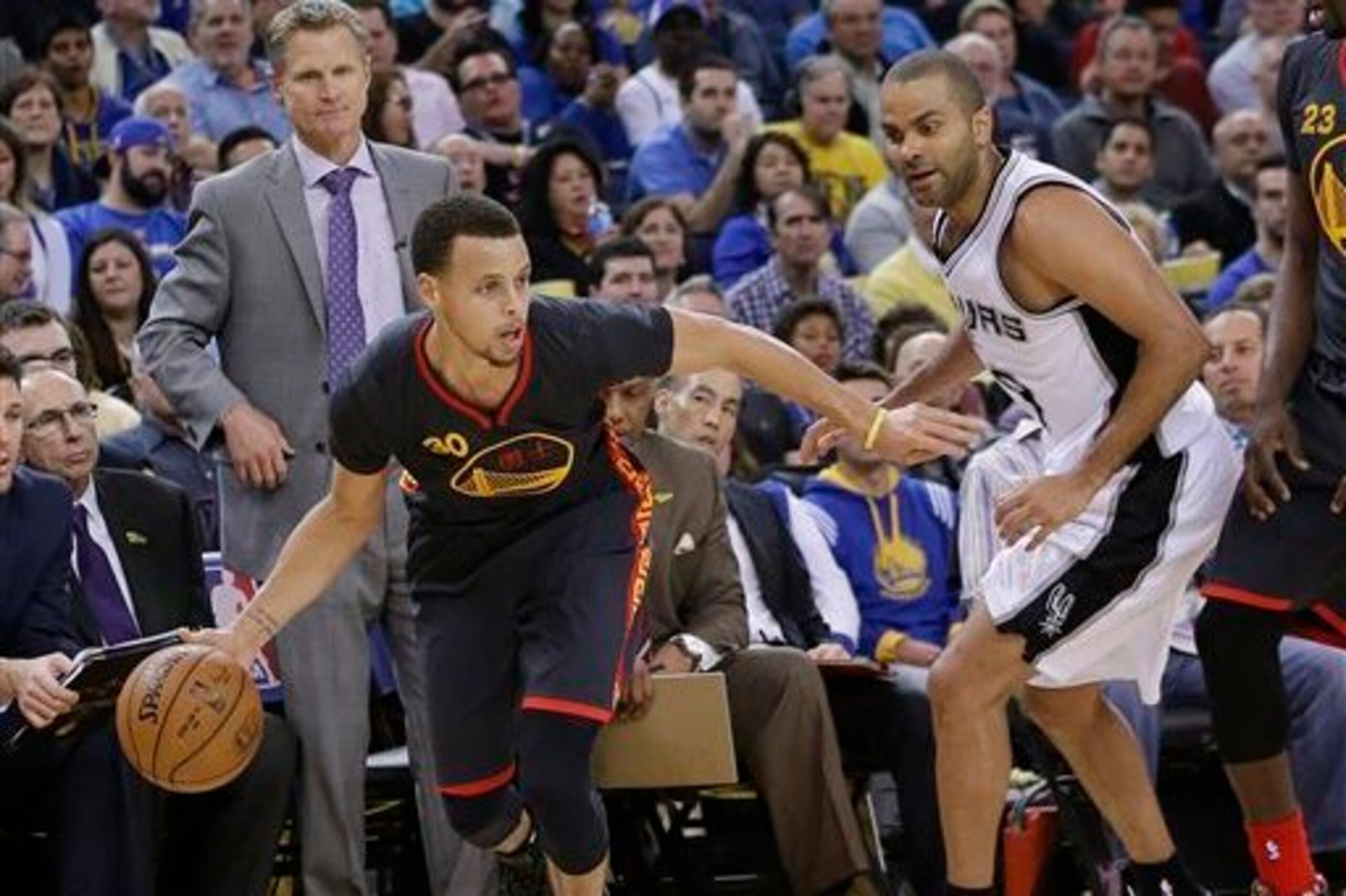 The Spurs' Tony Parker and the Warriors' Steph Curry