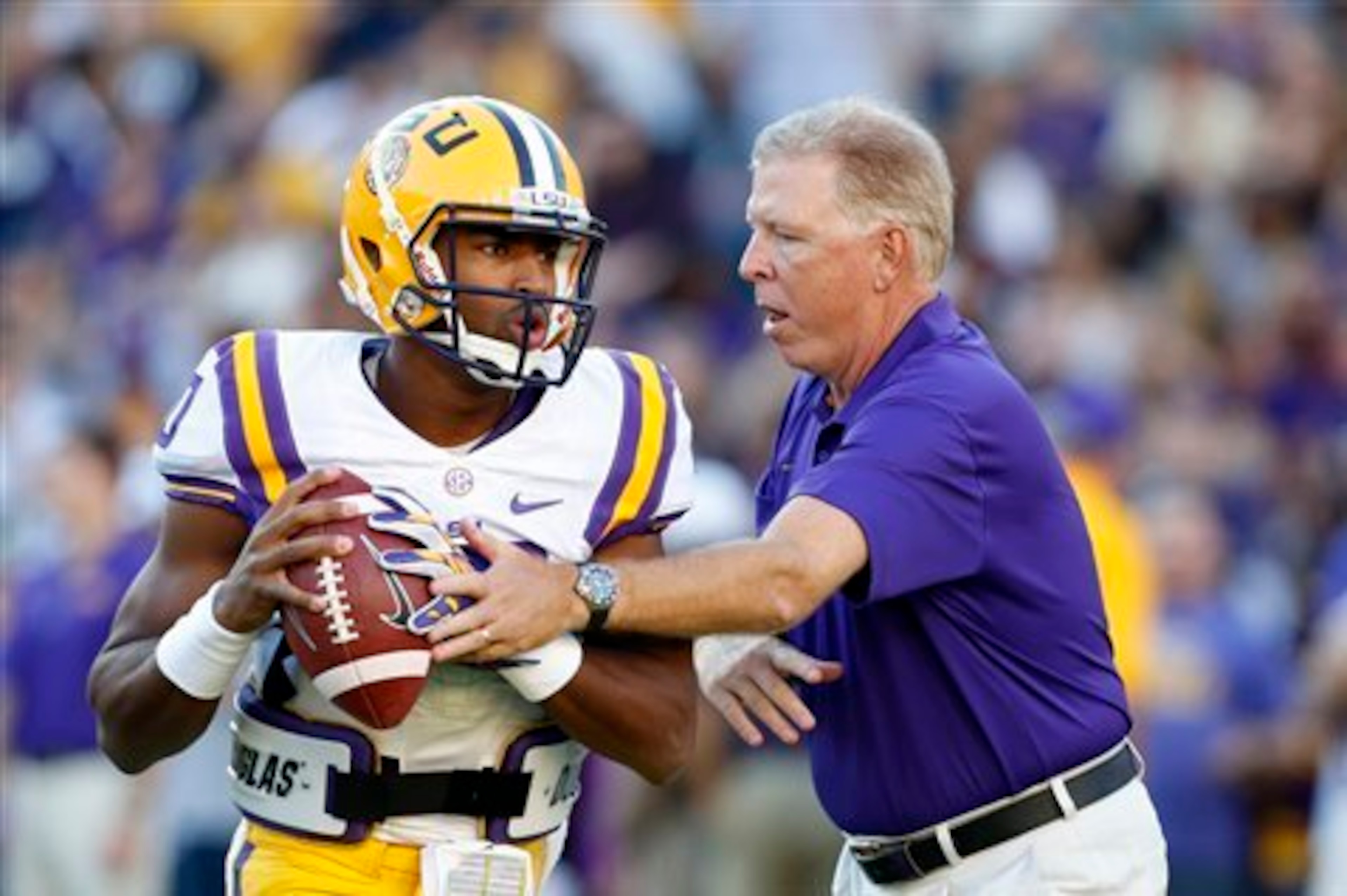 LSU QB Anthony Jennings (left) and offensive coordinator Cam Cameron